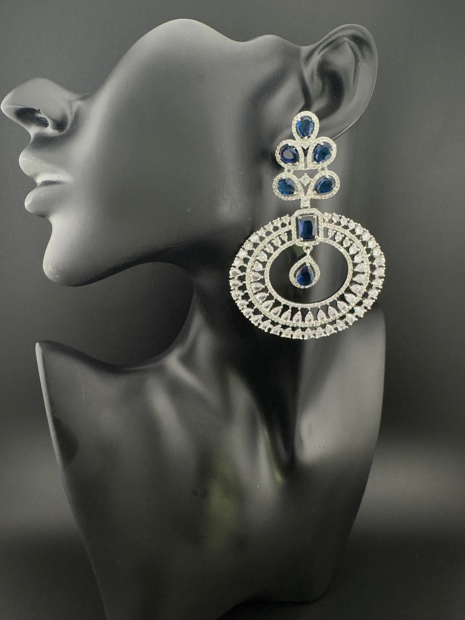 Premium Cubic Zirconia Oversized Chandelier earrings in stones in silver color is designer Inspired Long Statement earrings