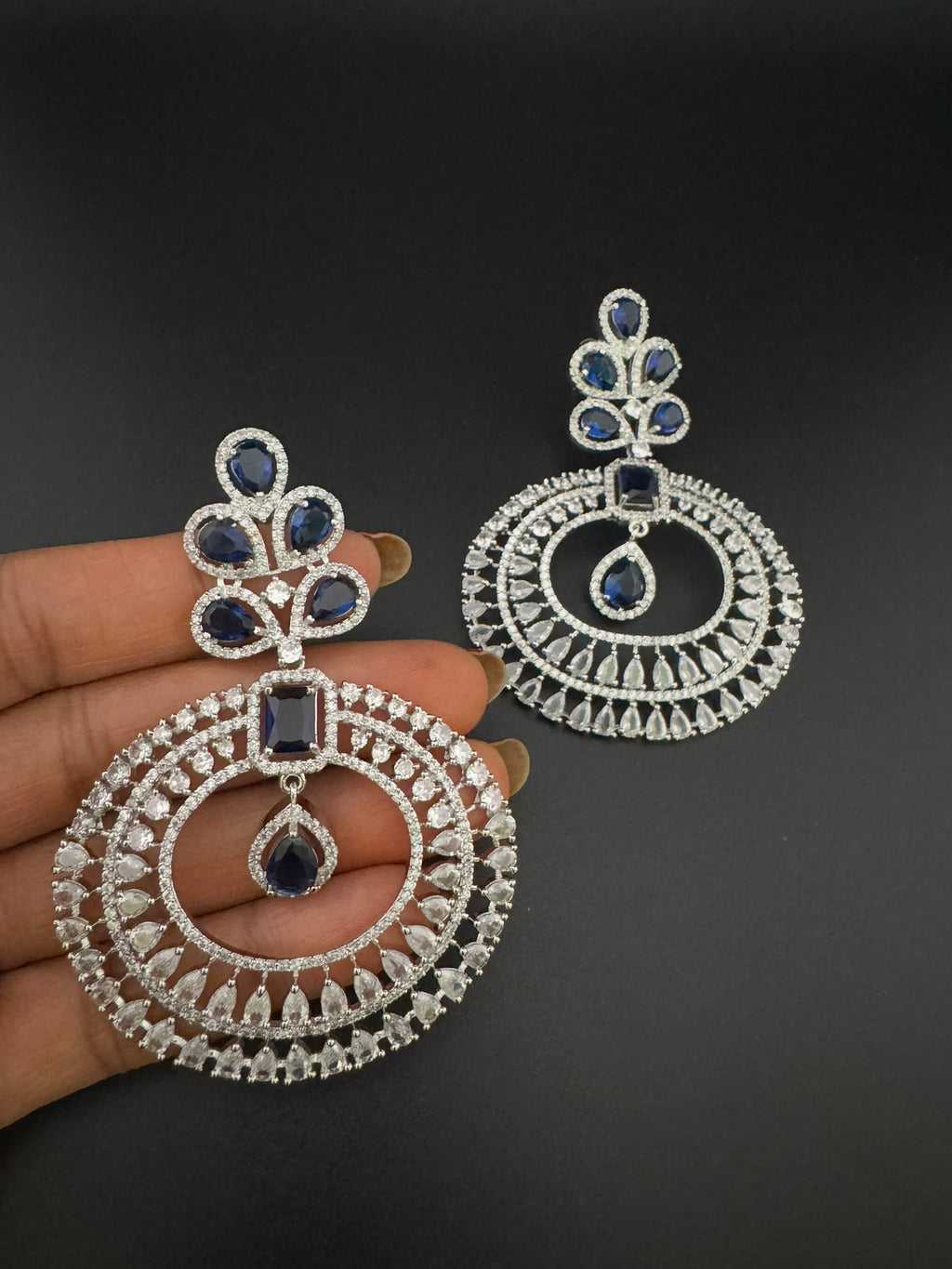 Premium Cubic Zirconia Oversized Chandelier earrings in stones in silver color is designer Inspired Long Statement earrings