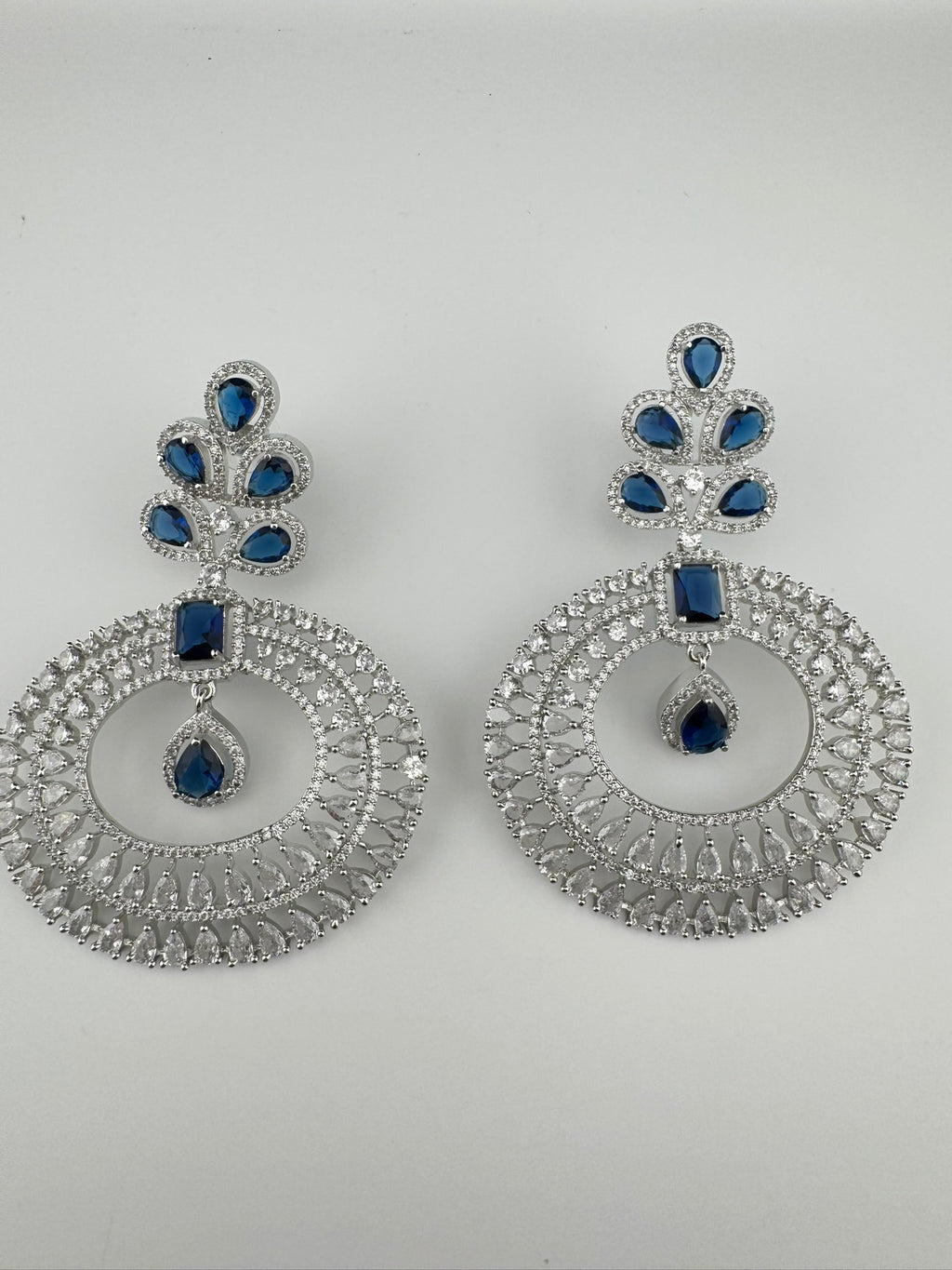 Premium Cubic Zirconia Oversized Chandelier earrings in stones in silver color is designer Inspired Long Statement earrings