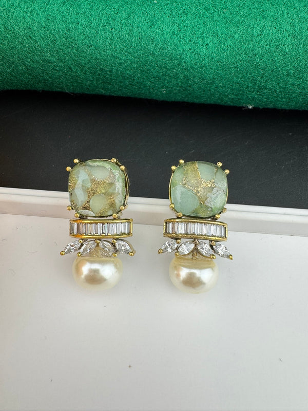 Premium High Quality Cubic Zirconia, Pearl, Marble Stone is a designer Stud earring/Small earrings/Lightweight Earring/Latest designer studs