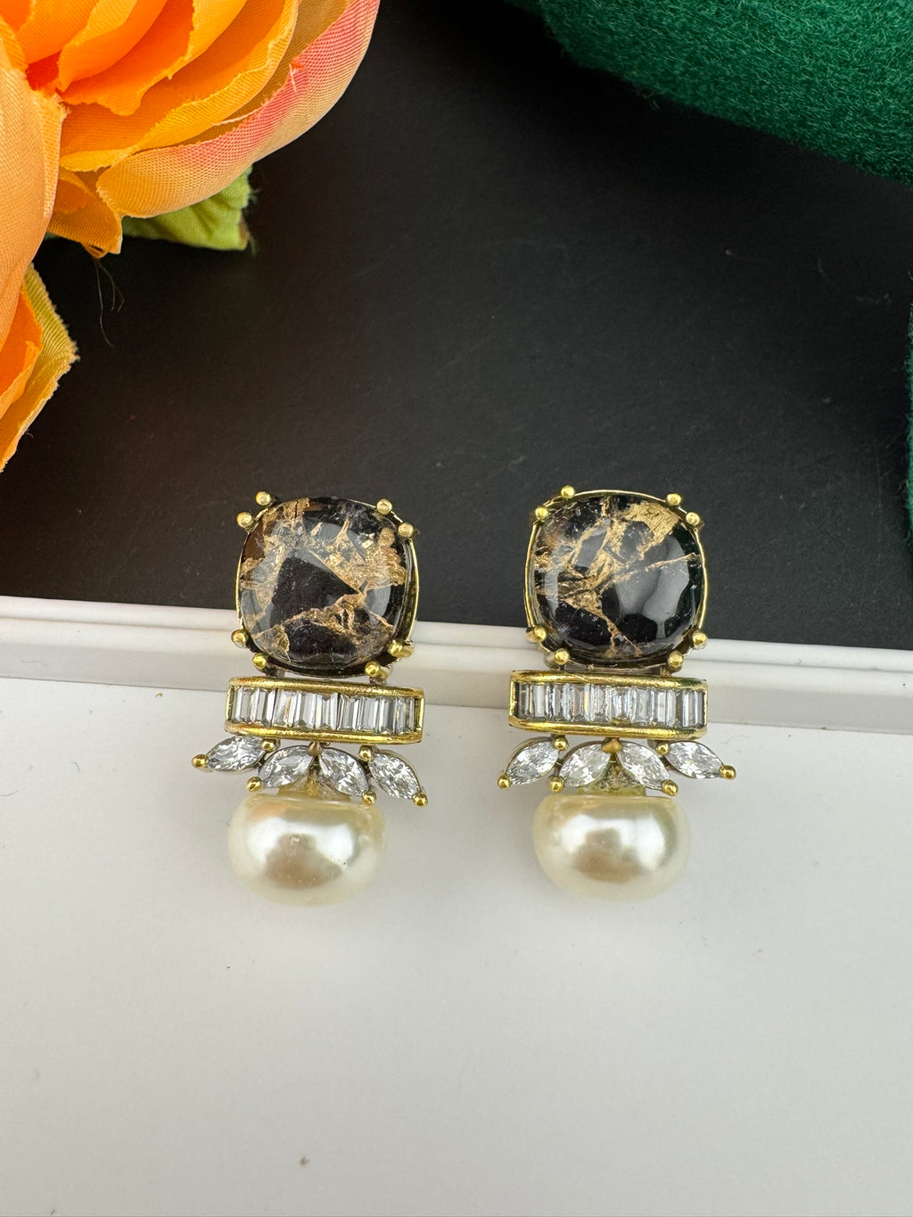 Premium High Quality Cubic Zirconia, Pearl, Marble Stone is a designer Stud earring/Small earrings/Lightweight Earring/Latest designer studs