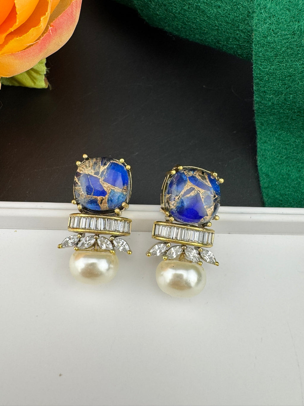 Premium High Quality Cubic Zirconia, Pearl, Marble Stone is a designer Stud earring/Small earrings/Lightweight Earring/Latest designer studs