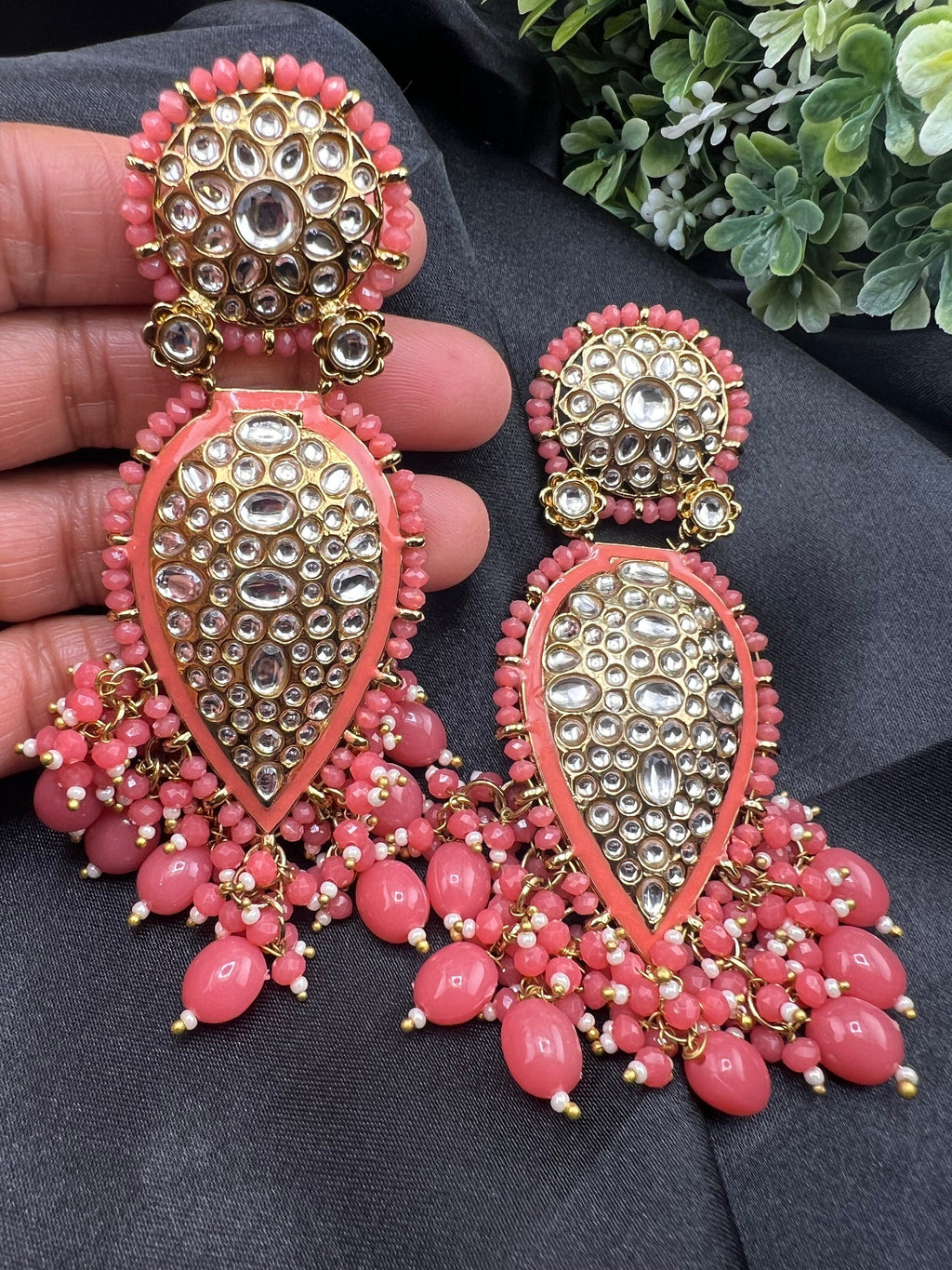 Exquisite detailed Gold and Coral color long Chand Bali Earrings with kundan and pearls