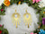 Matt Gold quirky earrings in unique sleek dazzle design