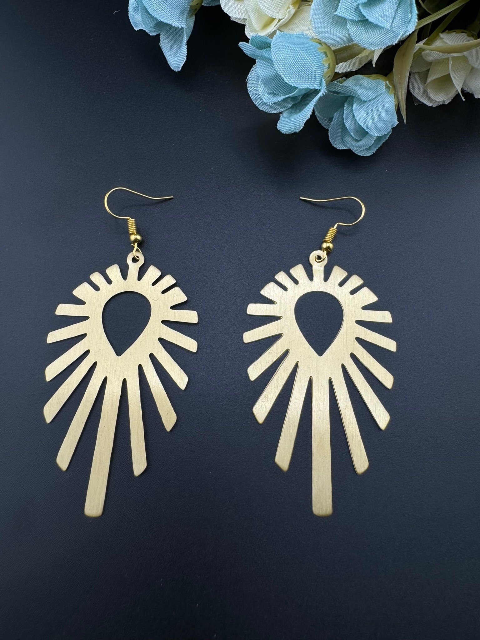 Matt Gold quirky earrings in unique sleek dazzle design