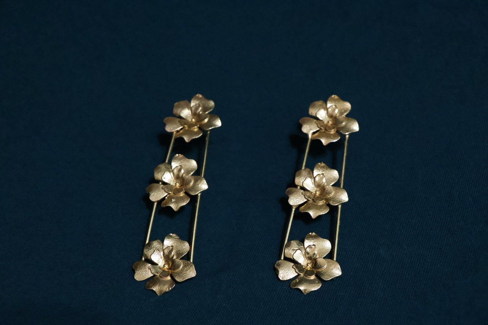 Matt Gold statement Long earrings with unique Flowers design