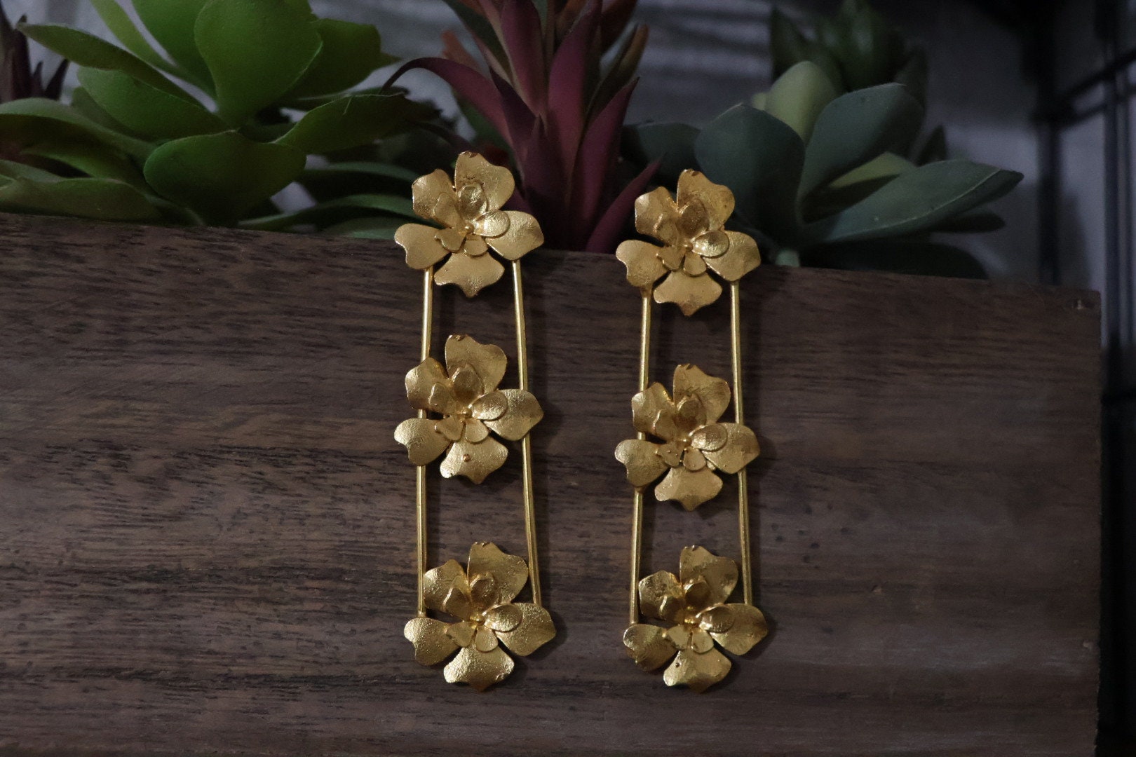 Matt Gold statement Long earrings with unique Flowers design