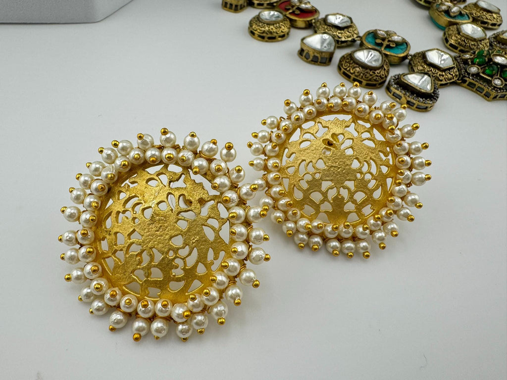 Premium Gold detailing and Pearls designer stud earring