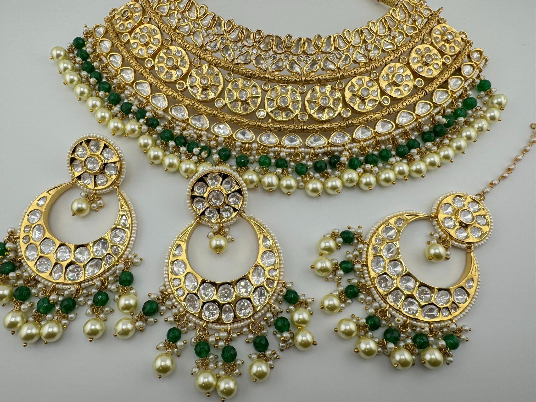 BRIDAL Tyaani Kundan Inspired Premium High gloss Broad Bridal necklace set with earring and Tika