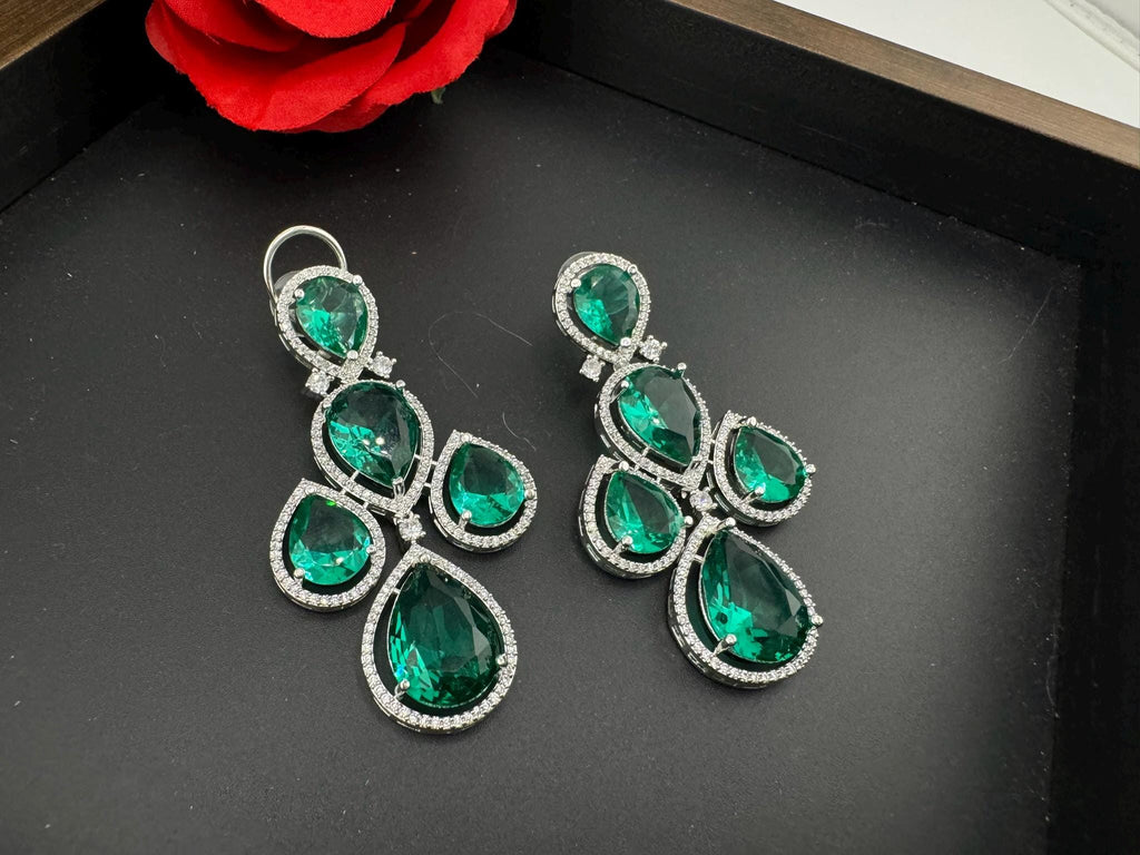 Premium Stones and Cubic Zirconia in unique drop style setting is a designer long earring/Indian earring/Bridal Jewelry/Swarovski Inspired