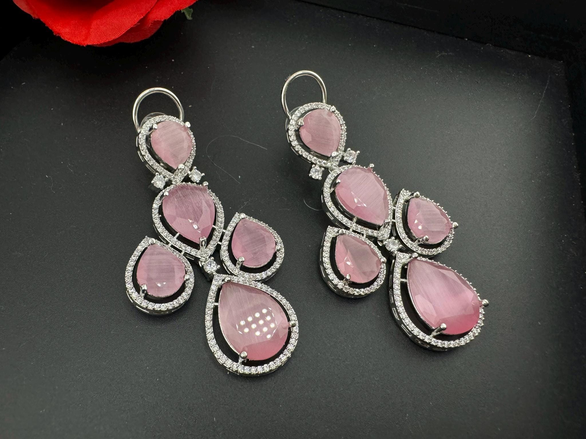 Premium Stones and Cubic Zirconia in unique drop style setting is a designer long earring/Indian earring/Bridal Jewelry/Swarovski Inspired