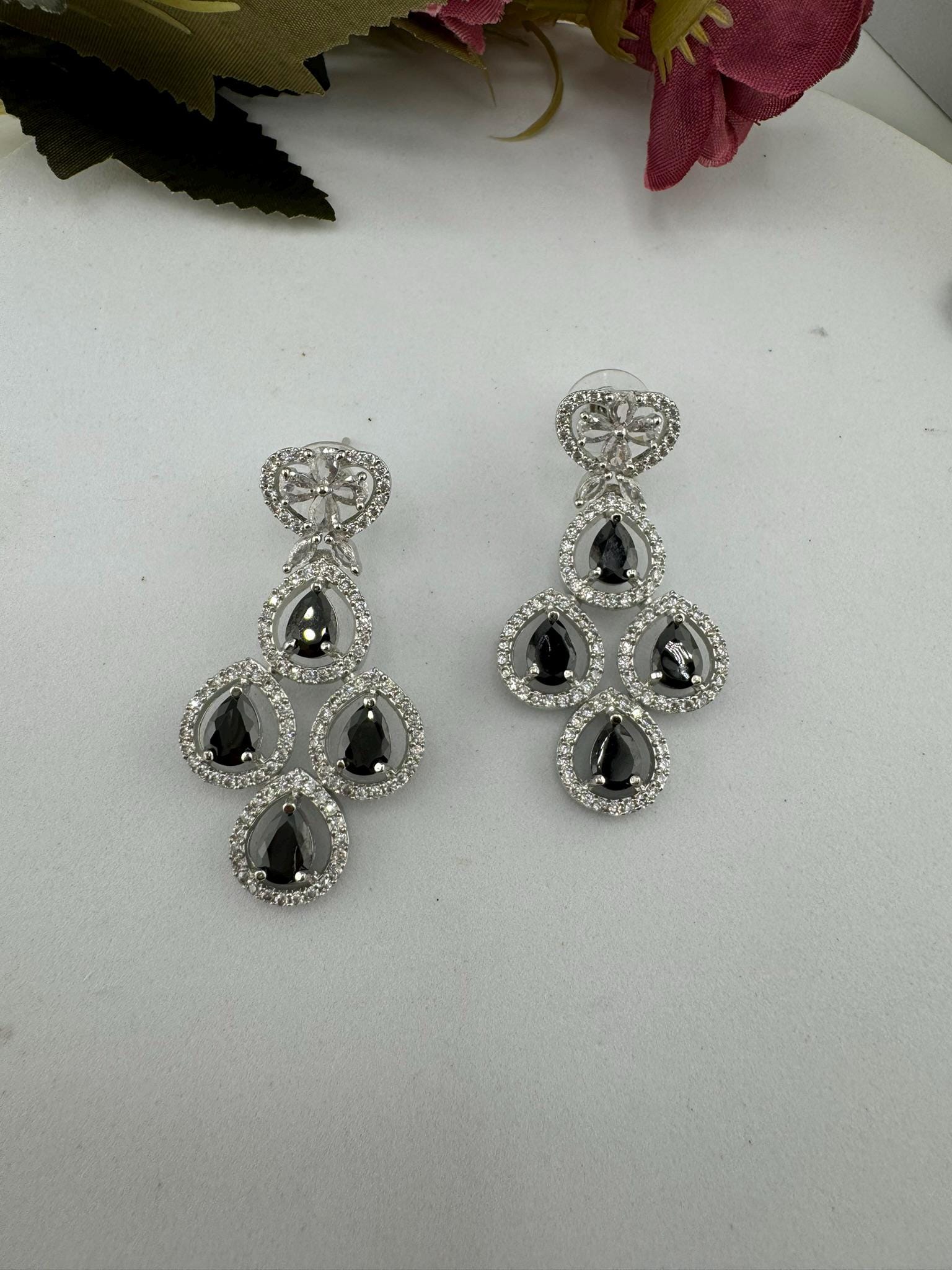 Premium Stones, Crystal and Cubic Zirconia in Different styles is a designer earring/Indian earring/Bridal Jewelry/American Diamond earrings