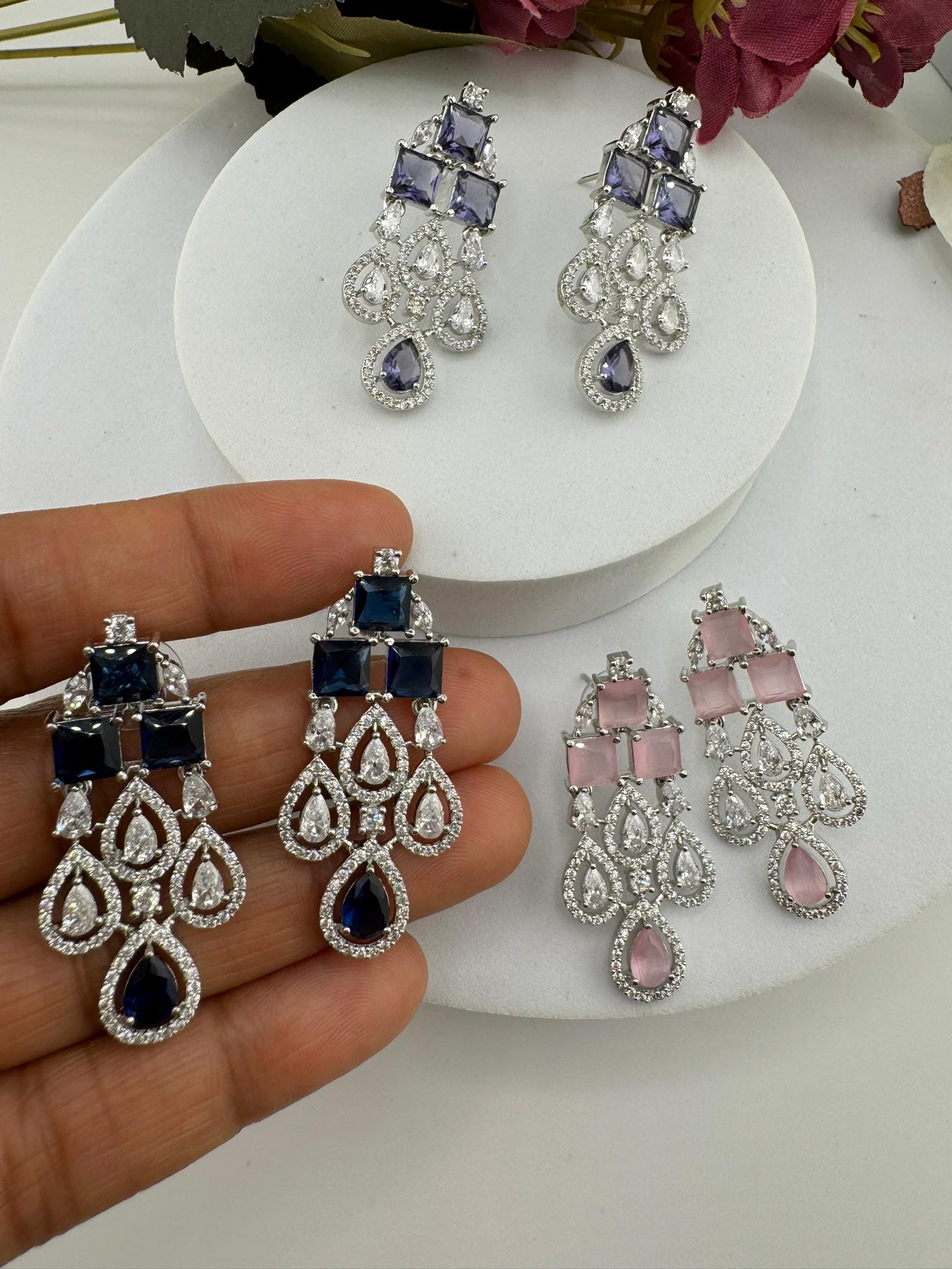 Premium Stones, Crystal and Cubic Zirconia in Different styles is a designer earring/Indian earring/Bridal Jewelry/American Diamond earrings