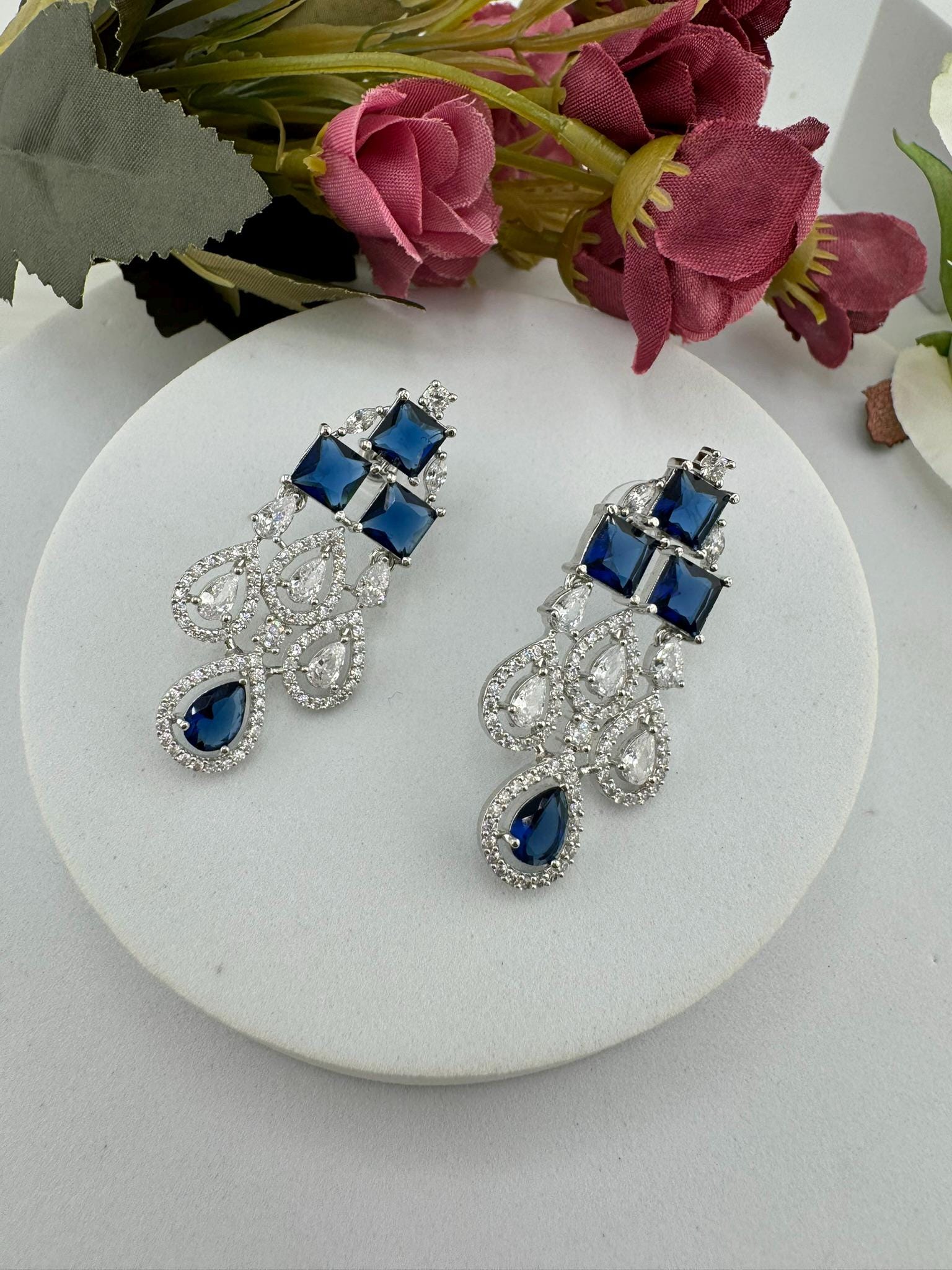 Premium Stones, Crystal and Cubic Zirconia in Different styles is a designer earring/Indian earring/Bridal Jewelry/American Diamond earrings