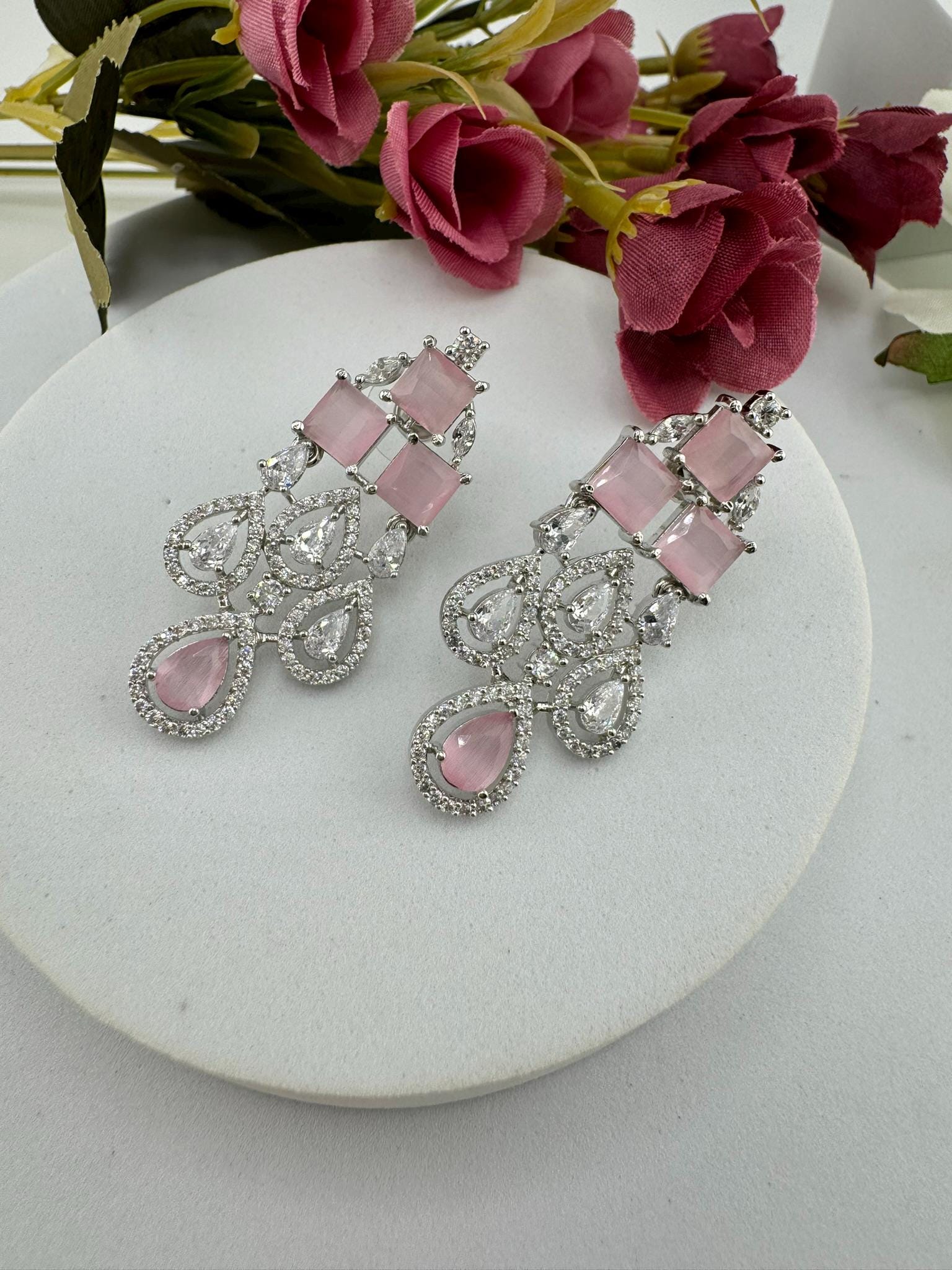 Premium Stones, Crystal and Cubic Zirconia in Different styles is a designer earring/Indian earring/Bridal Jewelry/American Diamond earrings