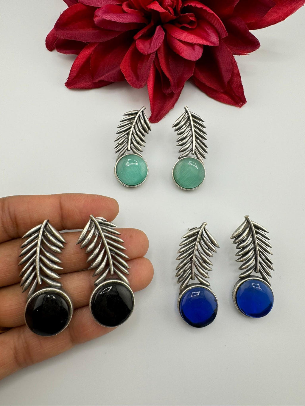 Oxidized German silver leaf pattern Stud earrings with Monalisa stone