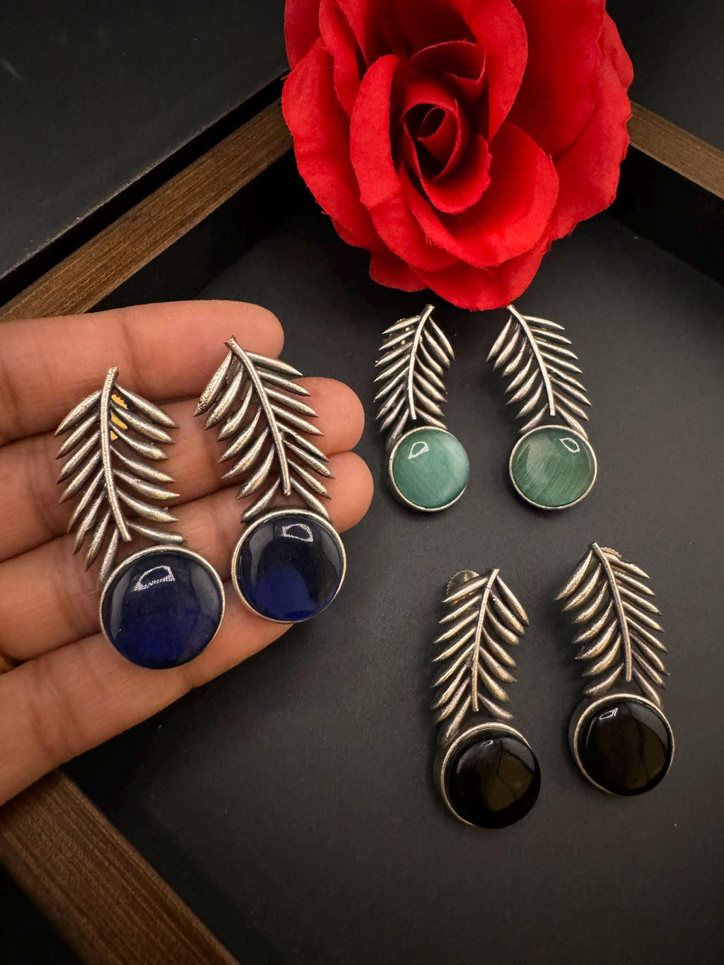 Oxidized German silver leaf pattern Stud earrings with Monalisa stone