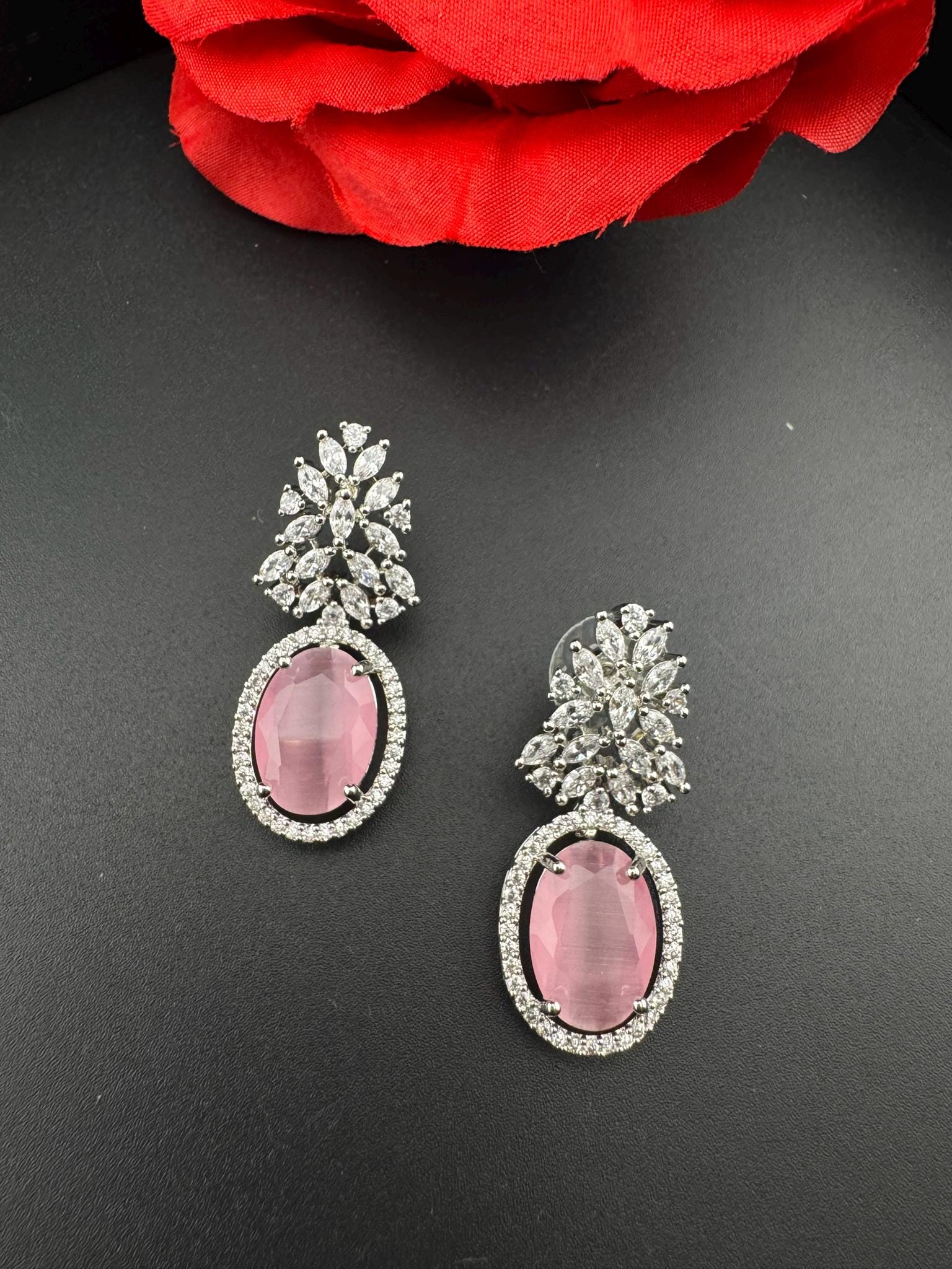 Premium Cubic Zirconia and Crystal stone in silver color is designer Inspired Statement earrings/Partywear earrings/bridal/Indian/high shine