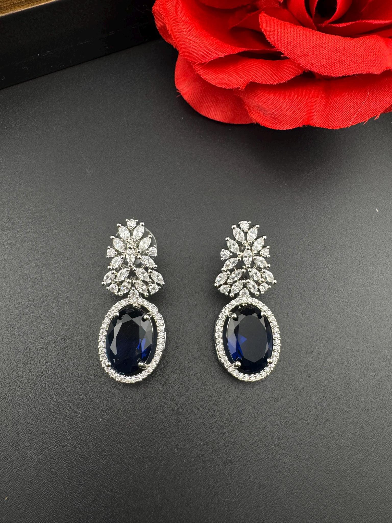 Premium Cubic Zirconia and Crystal stone in silver color is designer Inspired Statement earrings/Partywear earrings/bridal/Indian/high shine