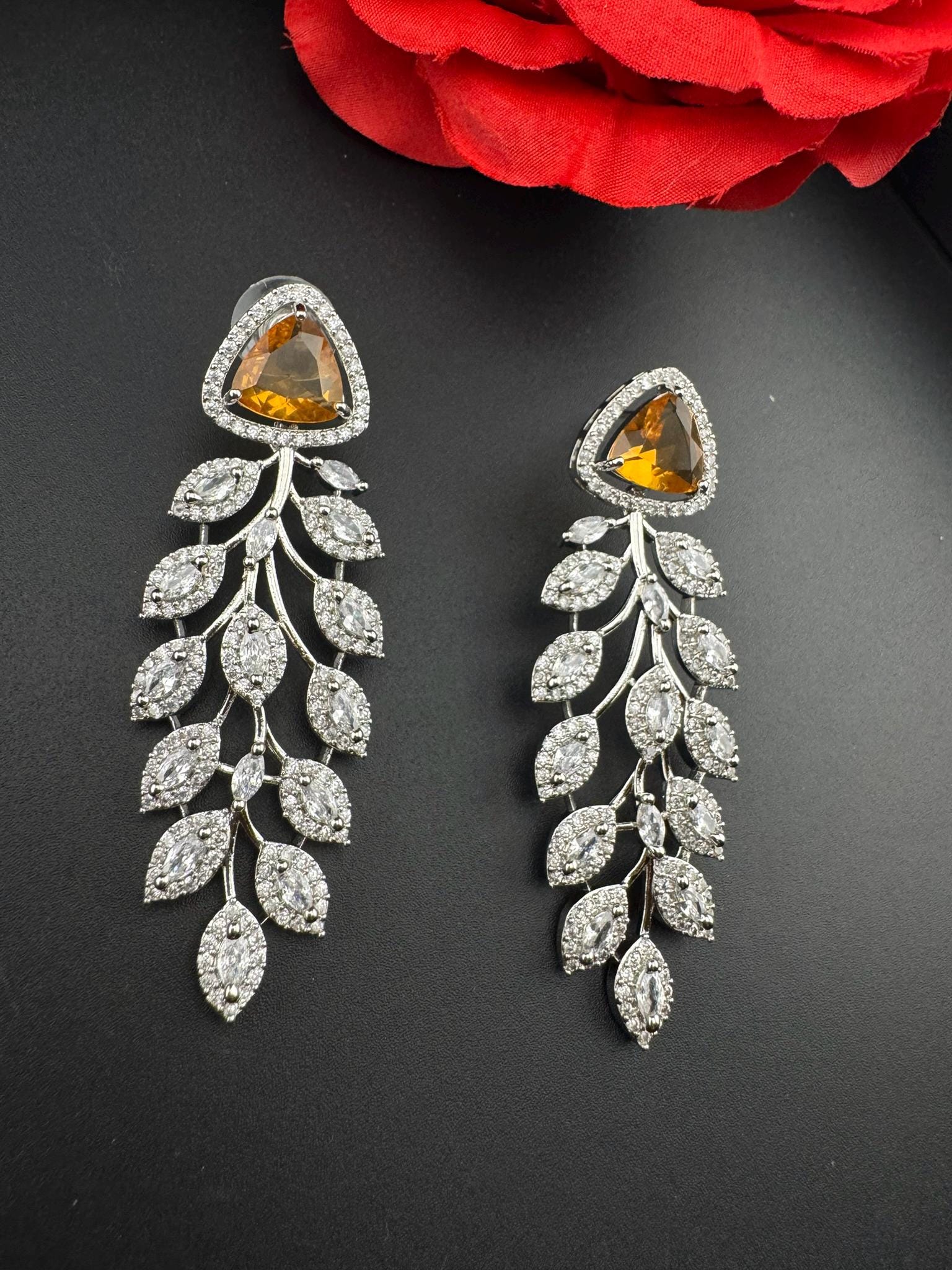 Premium Cubic Zirconia, Crystal, Natural stone in silver color is designer Inspired Statement Long earrings/Partywear bridal/Statement piece