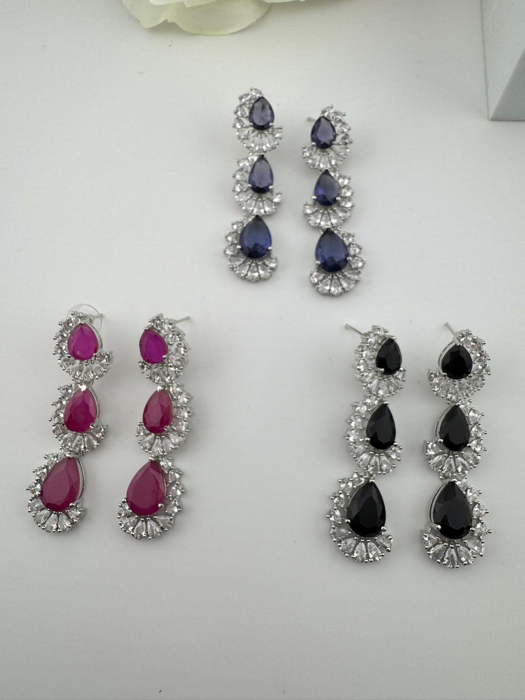 Premium Cubic Zirconia and Crystal stone in silver color Statement Long earrings