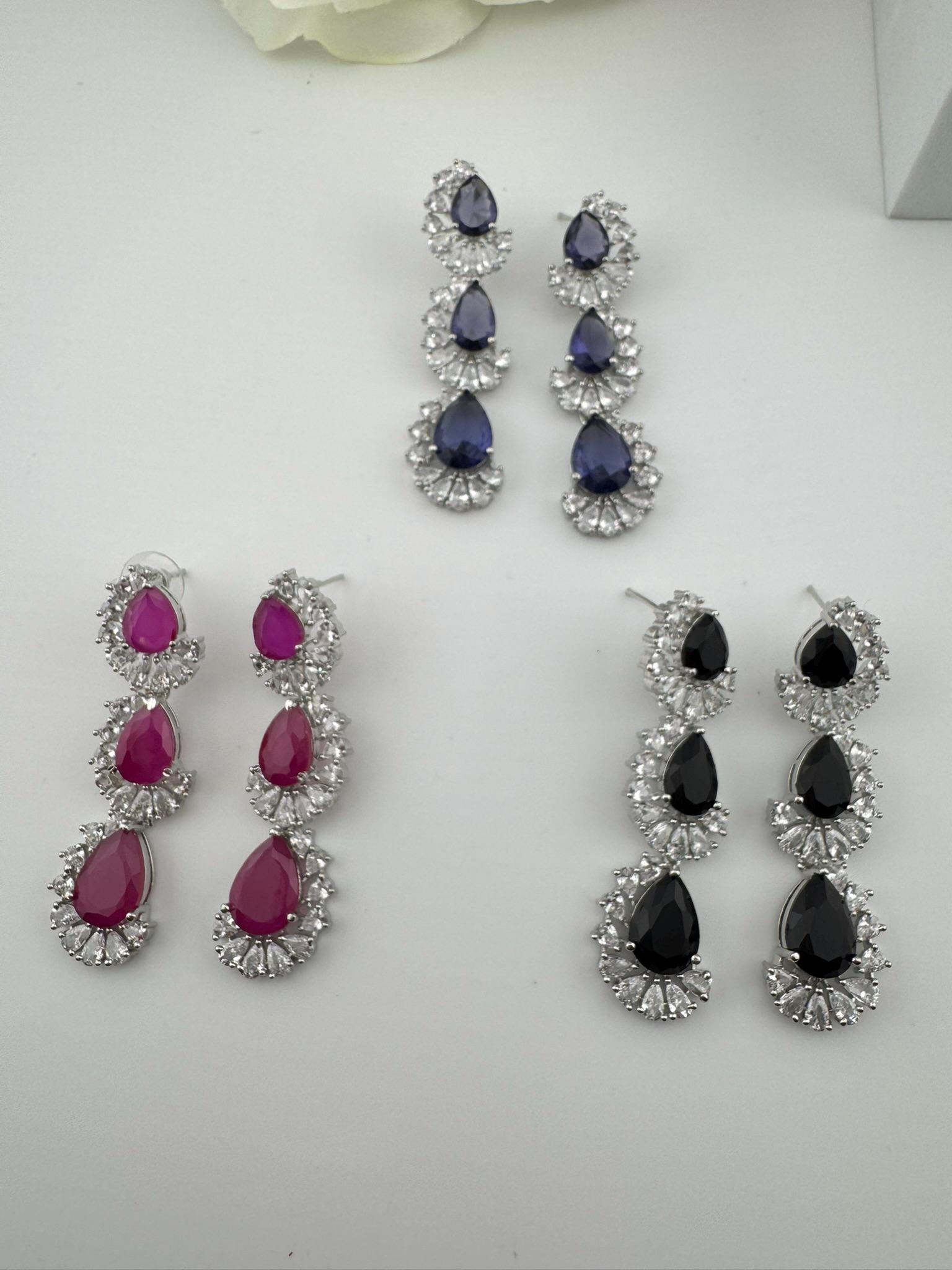 Premium Cubic Zirconia and Crystal stone in silver color Statement Long earrings