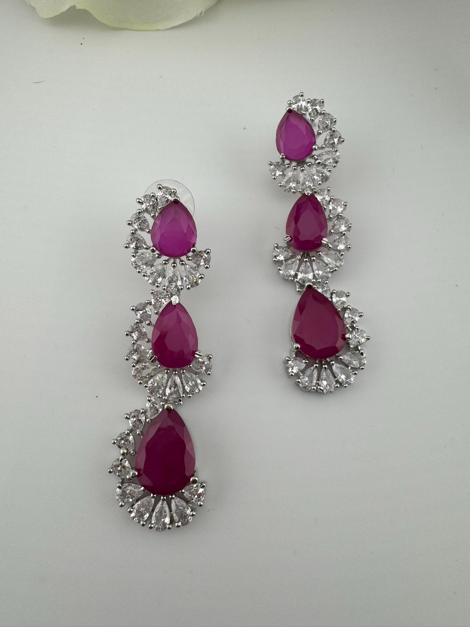 Premium Cubic Zirconia and Crystal stone in silver color Statement Long earrings
