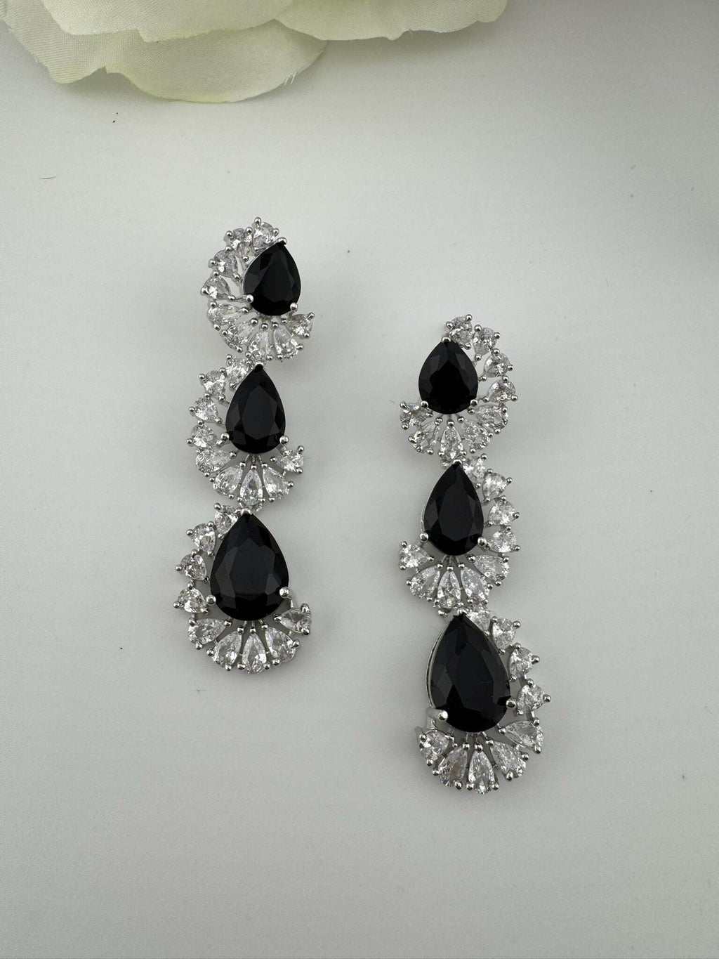 Premium Cubic Zirconia and Crystal stone in silver color Statement Long earrings