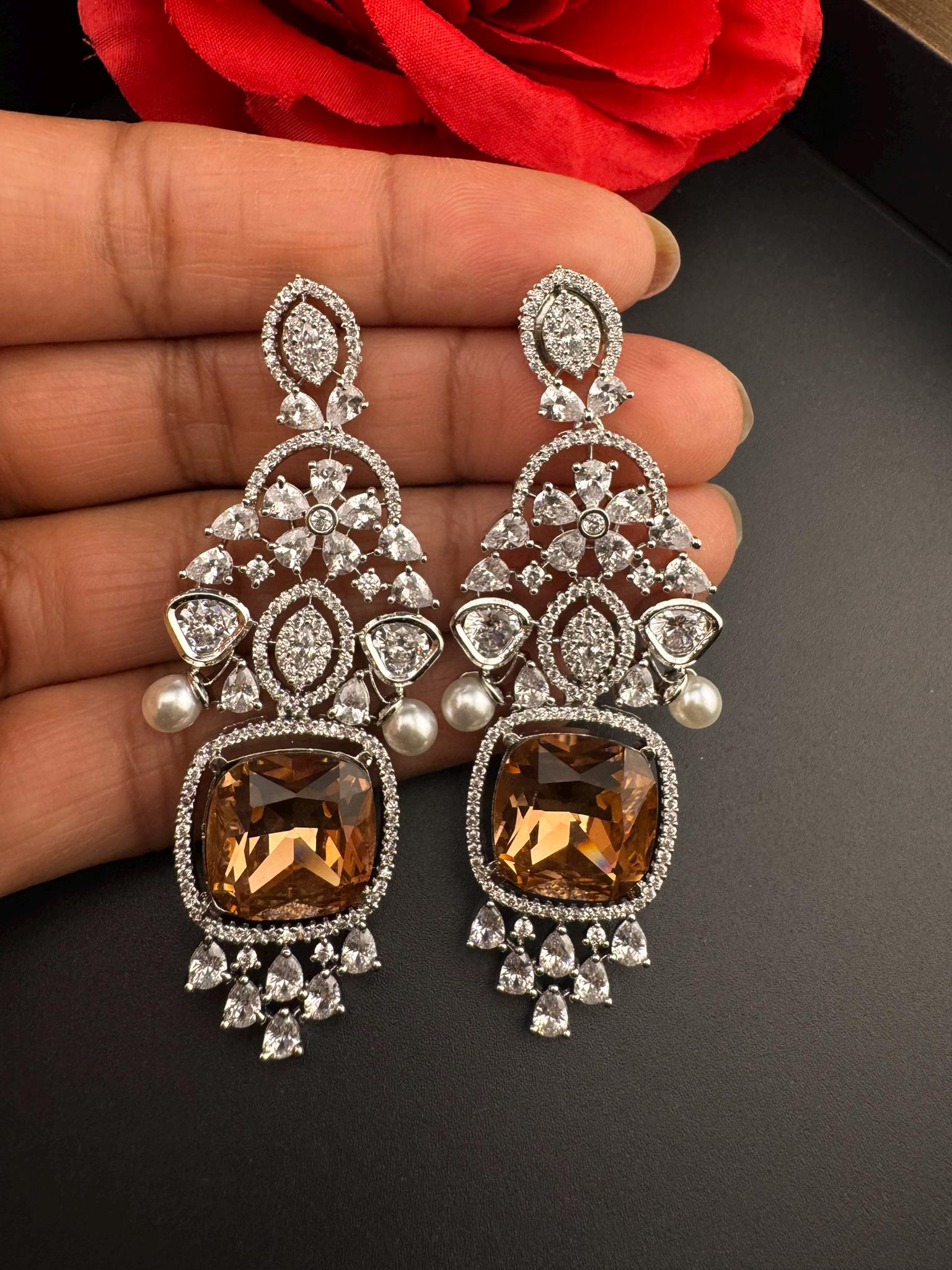 Premium Cubic Zirconia Chandelier earrings in Pearls, Crystal stones in silver color is Swarovski designer Inspired Statement Long earring