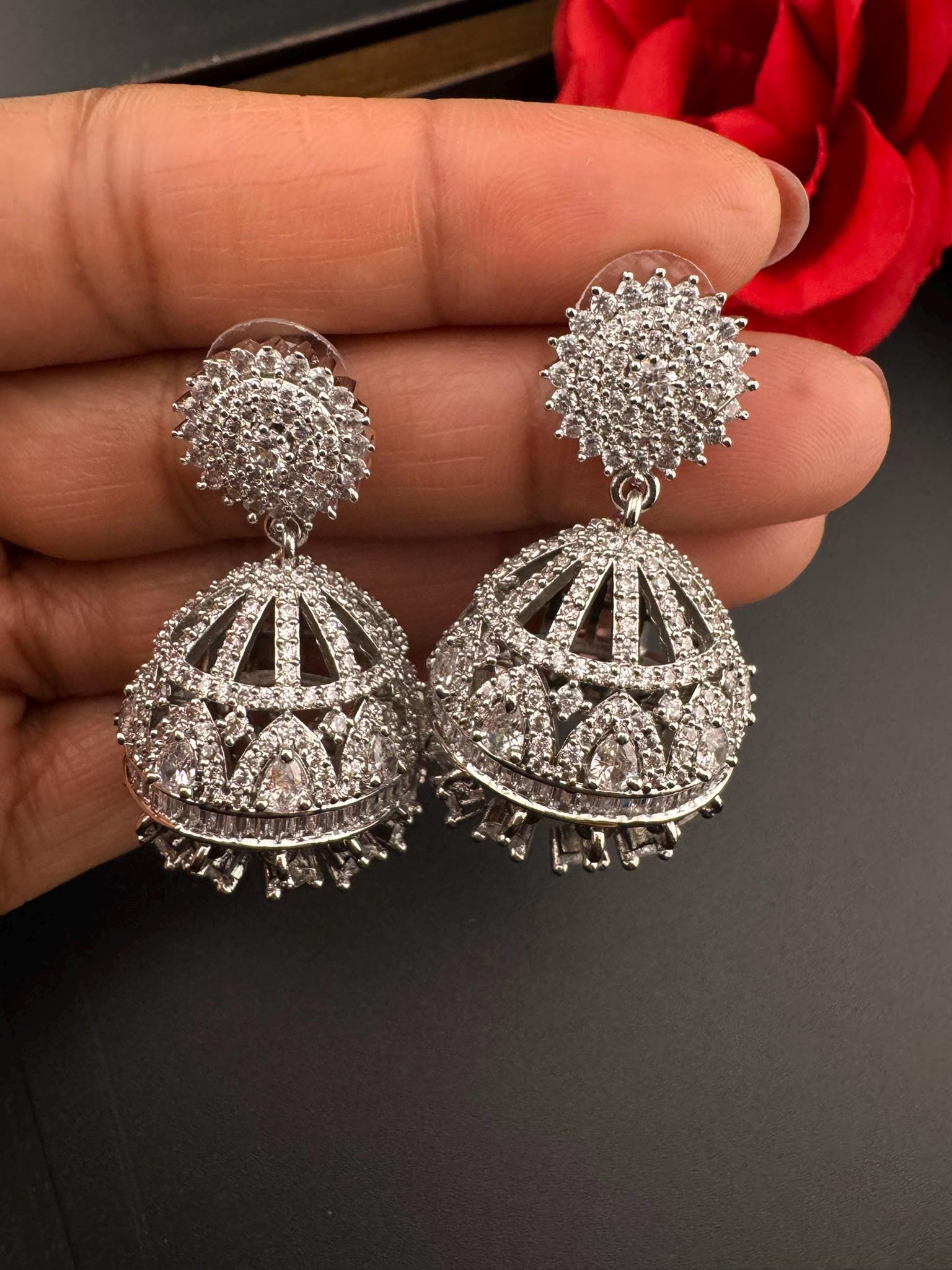 Premium Cubic Zirconia in unique setting in silver color is designer Inspired Statement Jhumka earrings/Partywear bridal/high shine/Jhumki