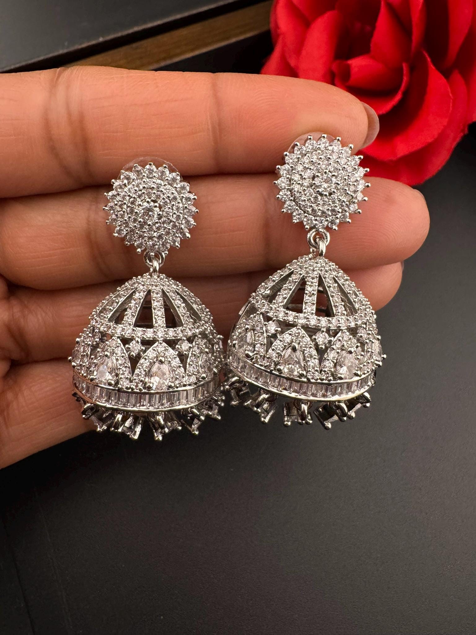 Premium Cubic Zirconia in unique setting in silver color is designer Inspired Statement Jhumka earrings/Partywear bridal/high shine/Jhumki