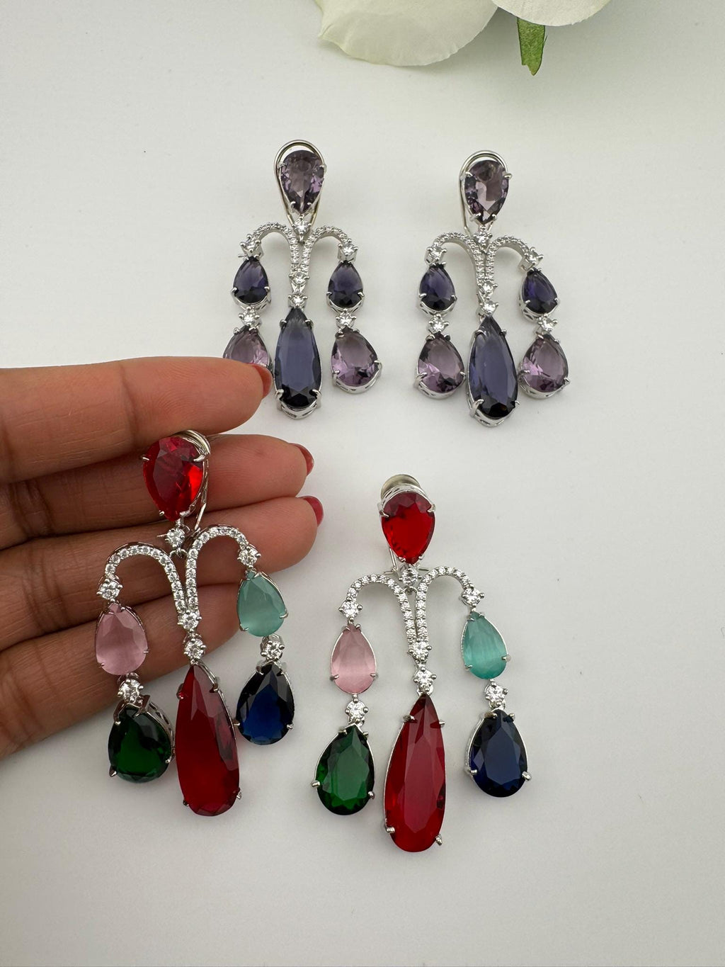 Premium Cubic Zirconia and glass stone in silver color is designer Inspired Statement Long earrings