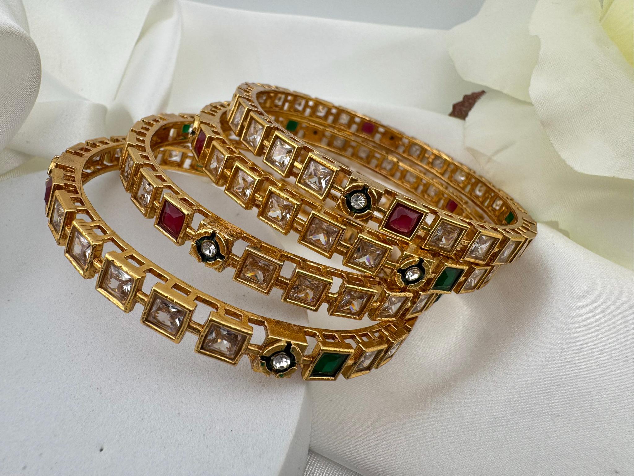 Set of 4 Matt Gold and multicolor stones in Amrapali inspired bangles set