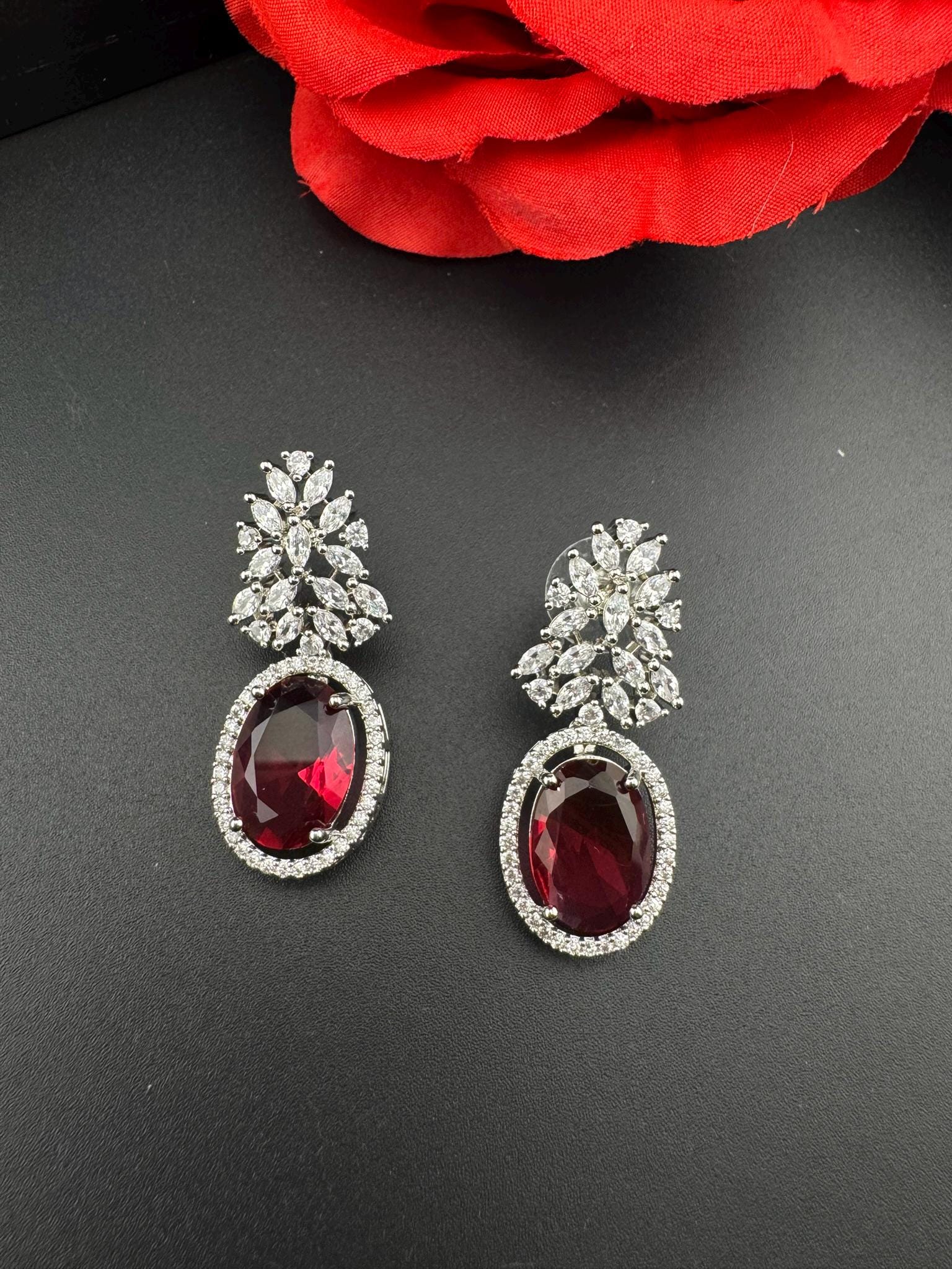 Premium Cubic Zirconia and Crystal stone in silver color is designer Inspired Statement earrings/Partywear earrings/bridal/Indian/high shine