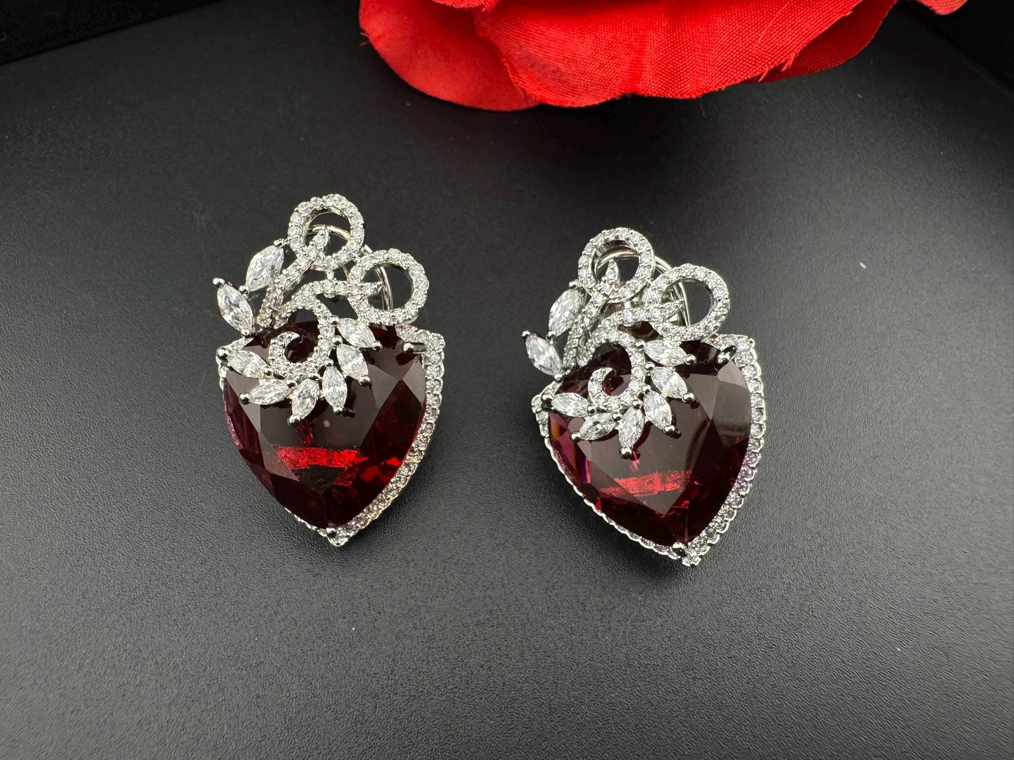 Premium Cubic Zirconia and Crystal stone in silver color is designer Inspired Statement earrings/Partywear earrings/bridal/Indian/Big Studs