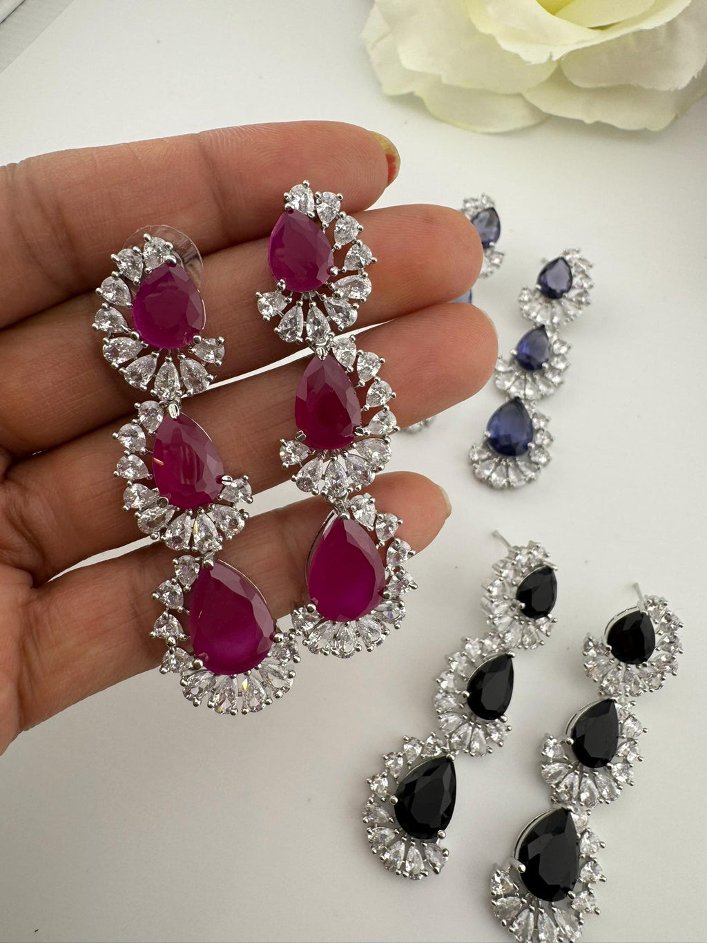 Premium Cubic Zirconia and Crystal stone in silver color Statement Long earrings