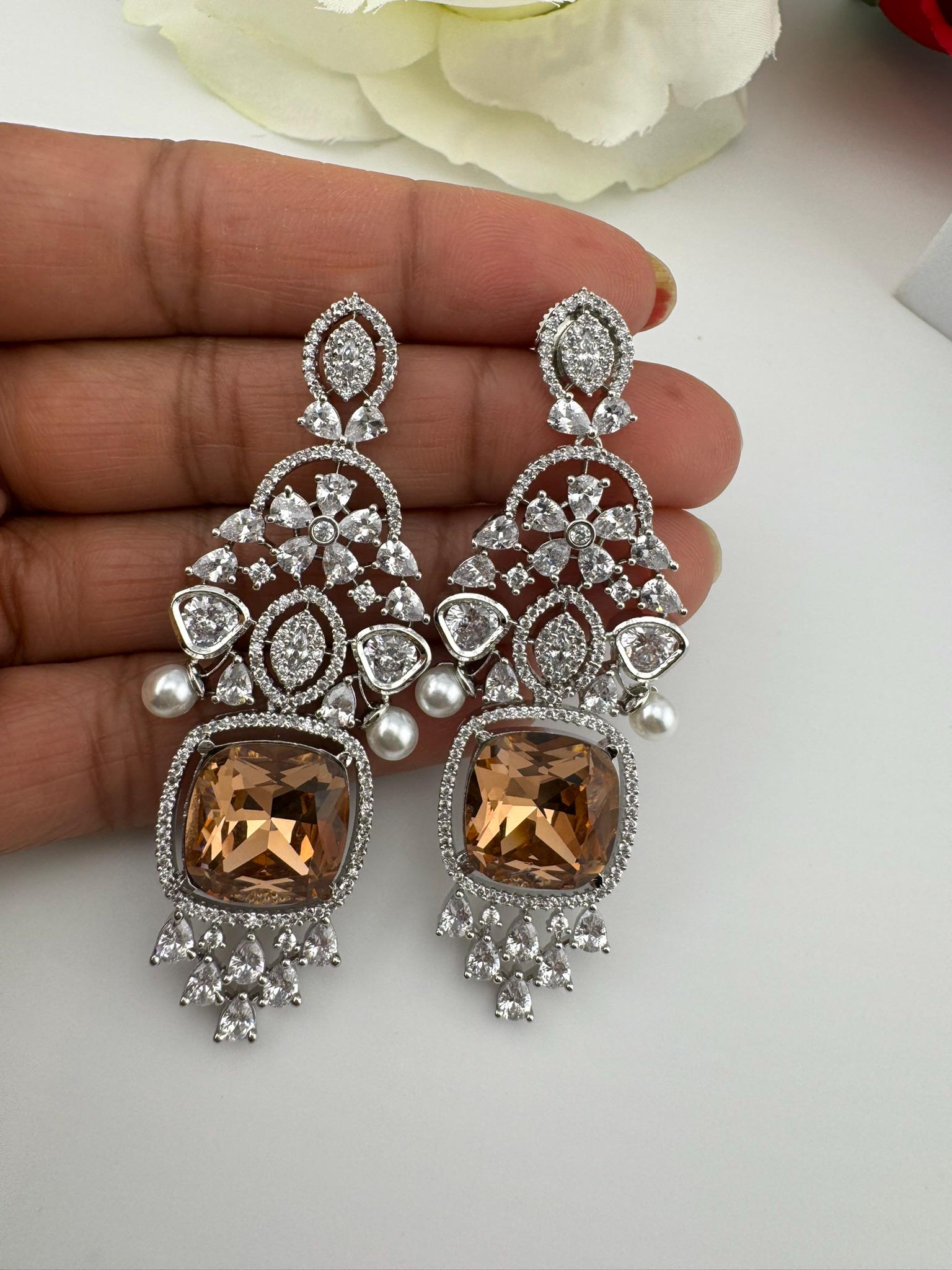 Premium Cubic Zirconia Chandelier earrings in Pearls, Crystal stones in silver color is Swarovski designer Inspired Statement Long earring