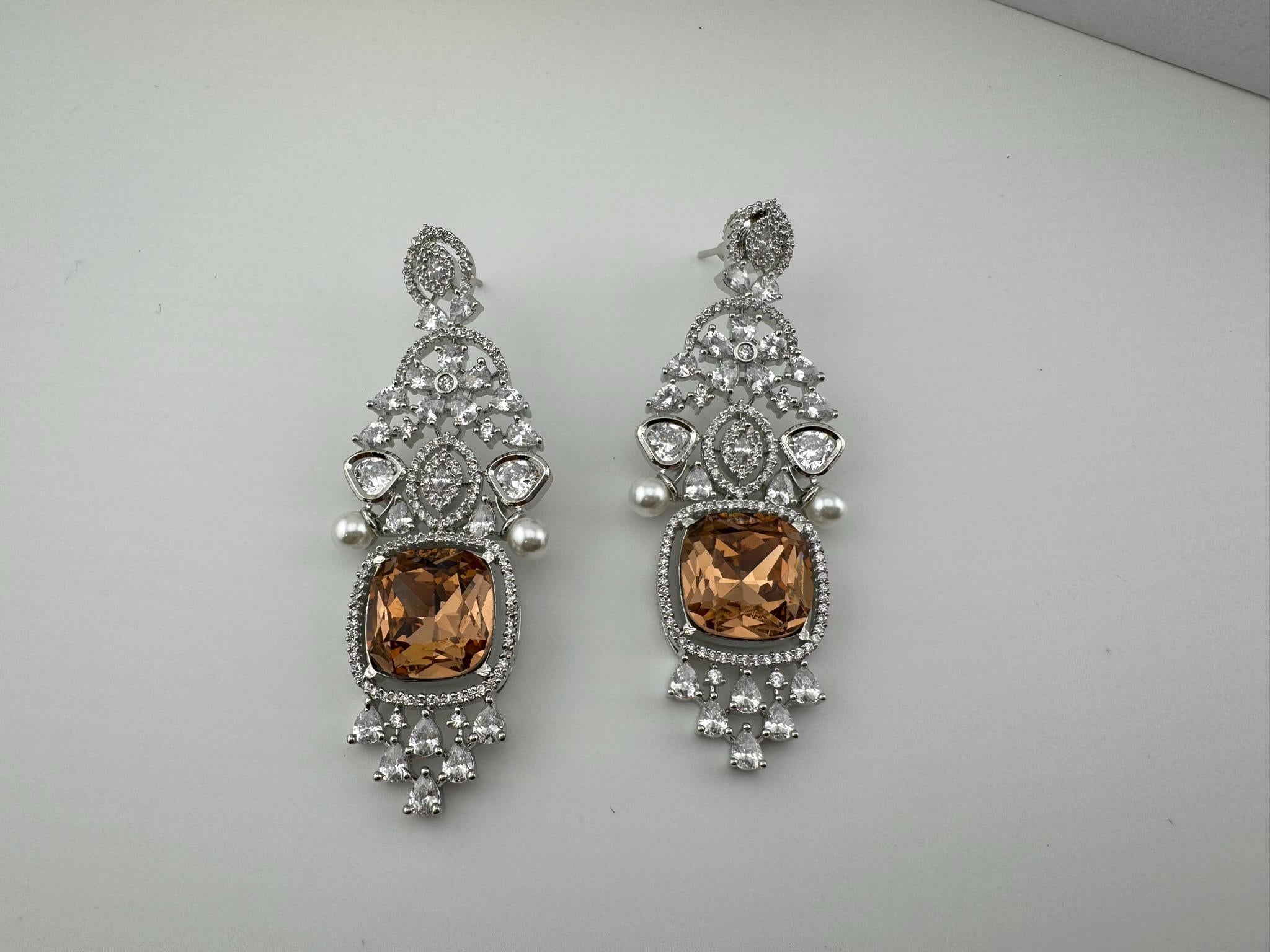 Premium Cubic Zirconia Chandelier earrings in Pearls, Crystal stones in silver color is Swarovski designer Inspired Statement Long earring