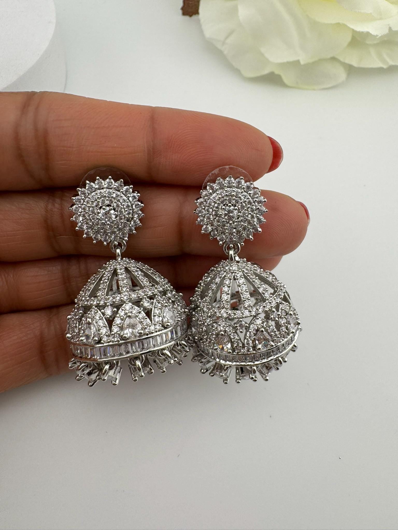 Premium Cubic Zirconia in unique setting in silver color is designer Inspired Statement Jhumka earrings/Partywear bridal/high shine/Jhumki