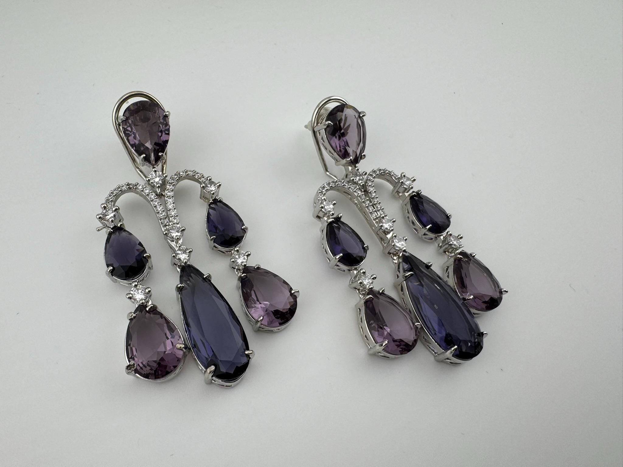 Premium Cubic Zirconia and glass stone in silver color is designer Inspired Statement Long earrings