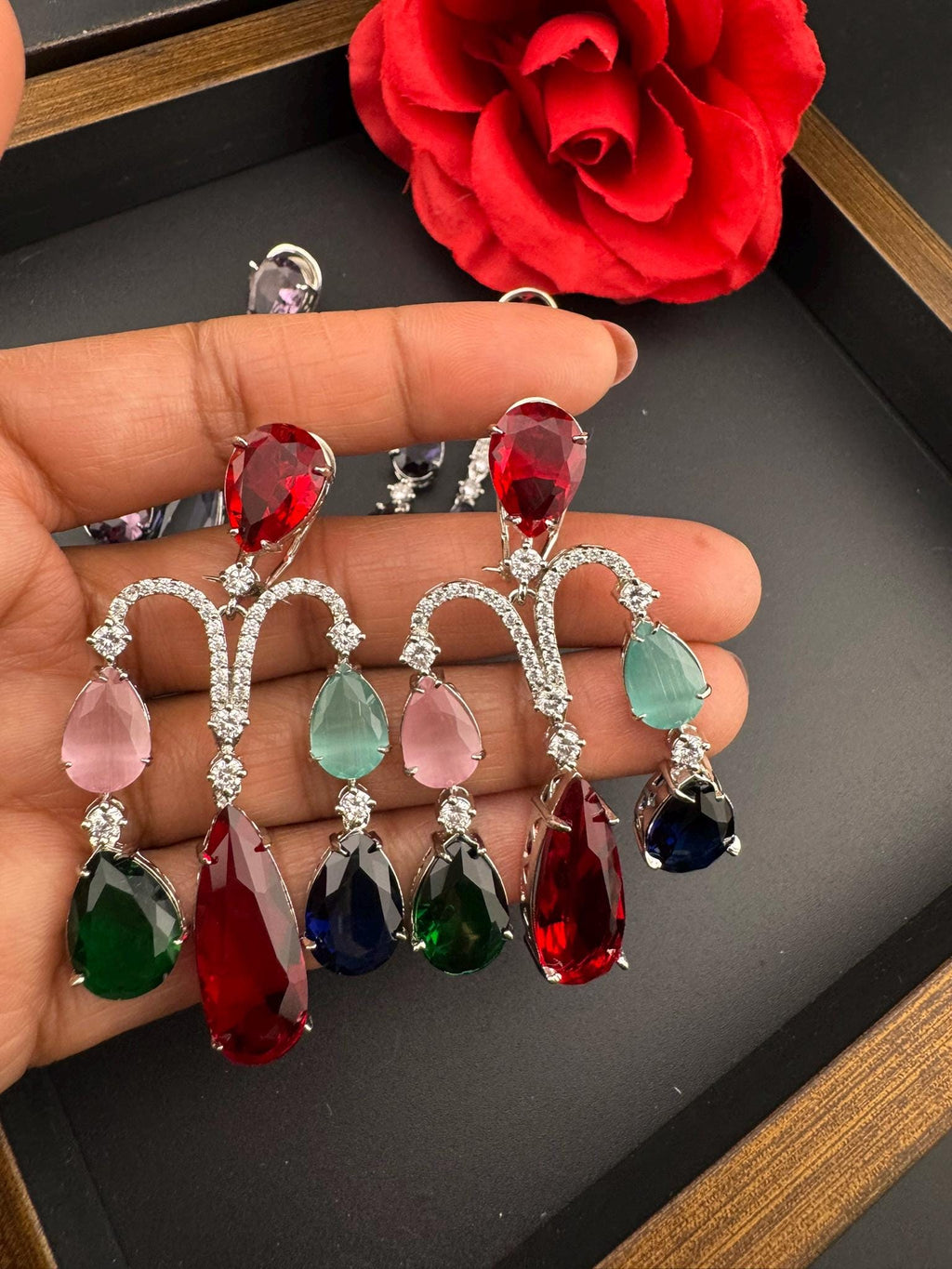 Premium Cubic Zirconia and glass stone in silver color is designer Inspired Statement Long earrings