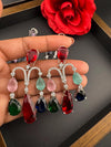 Premium Cubic Zirconia and glass stone in silver color is designer Inspired Statement Long earrings