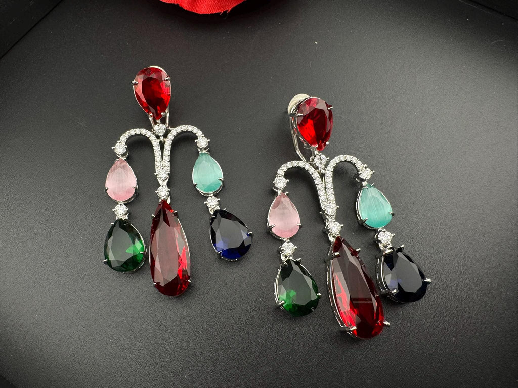 Premium Cubic Zirconia and glass stone in silver color is designer Inspired Statement Long earrings