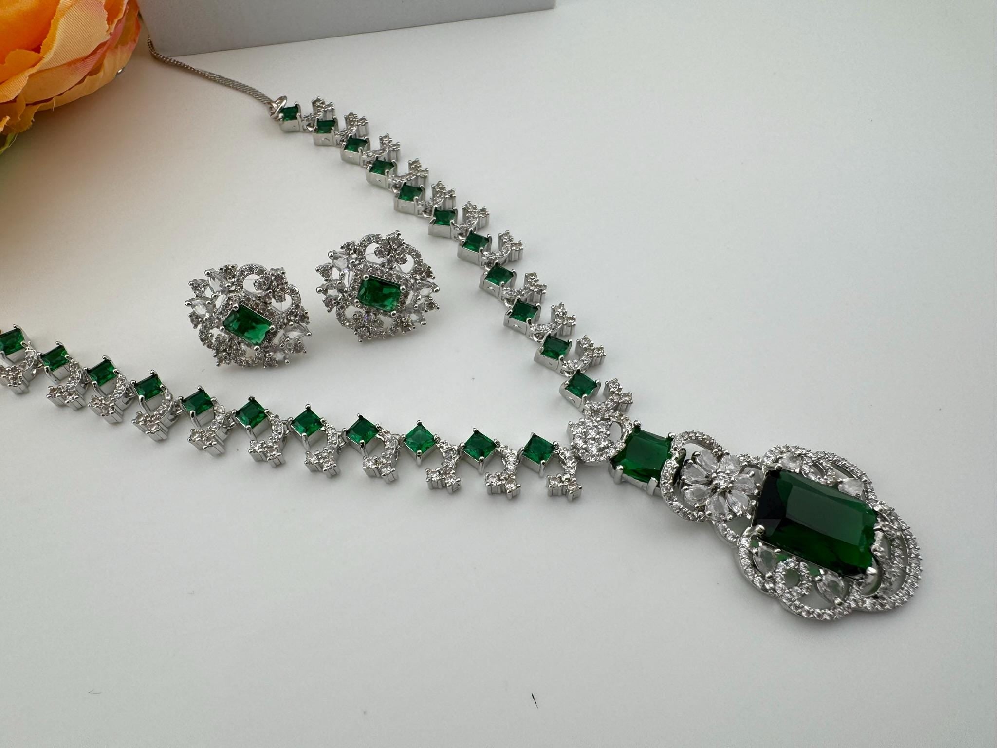 Premium American Diamond, Cubic Zirconia, Silver Polish Green Neeta Ambani Necklace set with studs earring