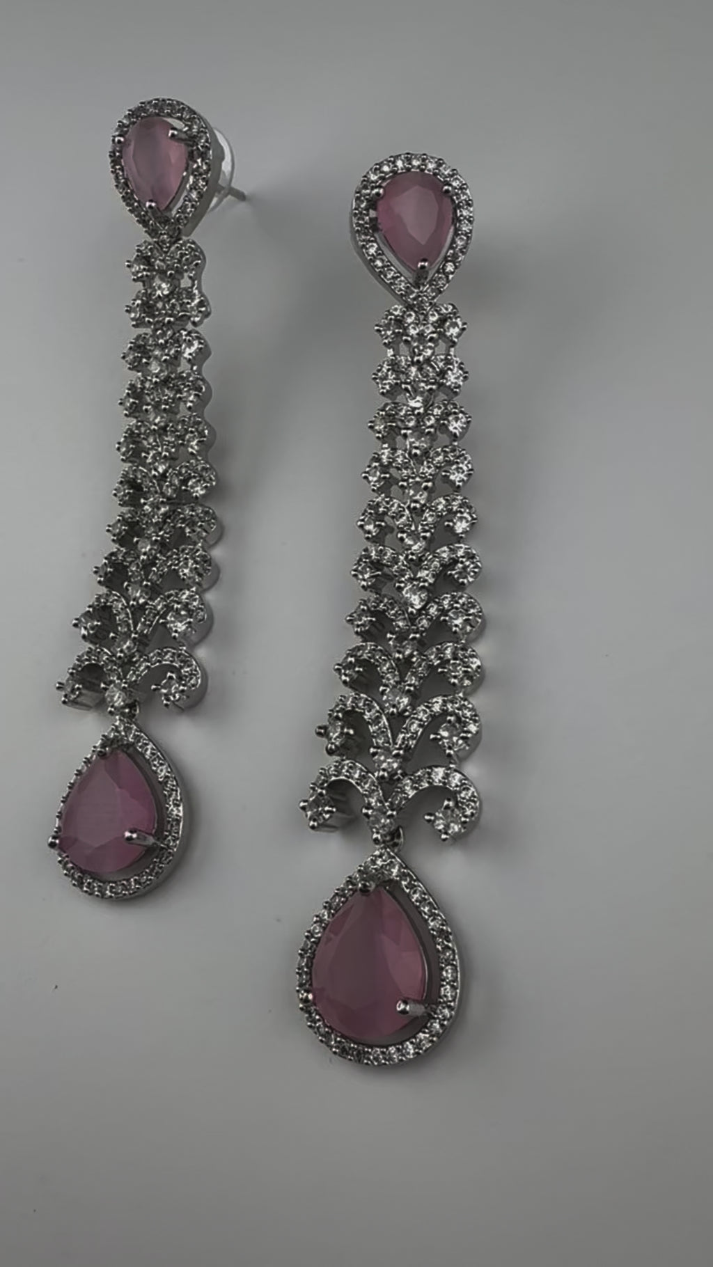 Premium Cubic Zirconia and Crystal stone in silver color is designer Inspired Statement Long earrings