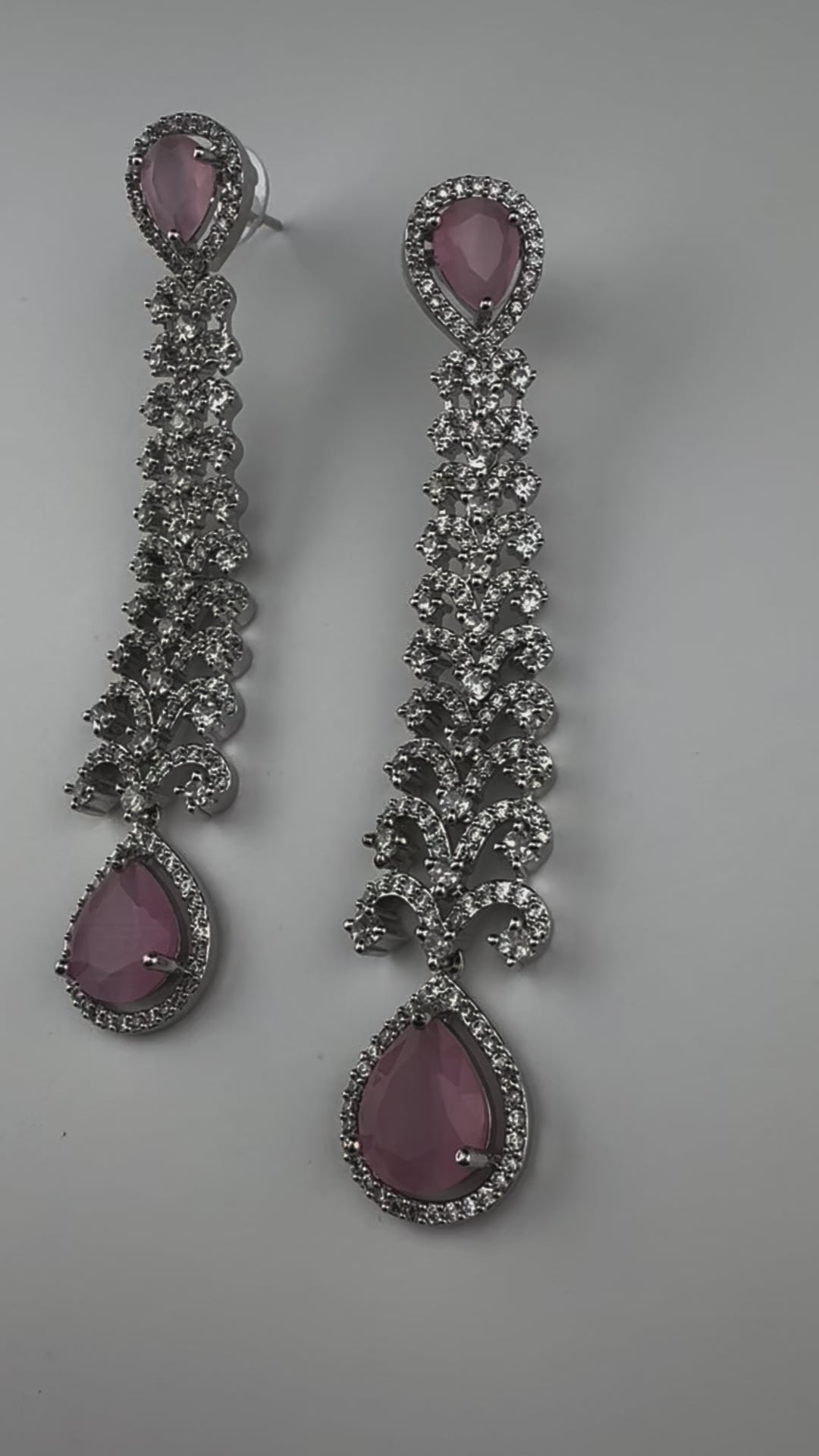 Premium Cubic Zirconia and Crystal stone in silver color is designer Inspired Statement Long earrings