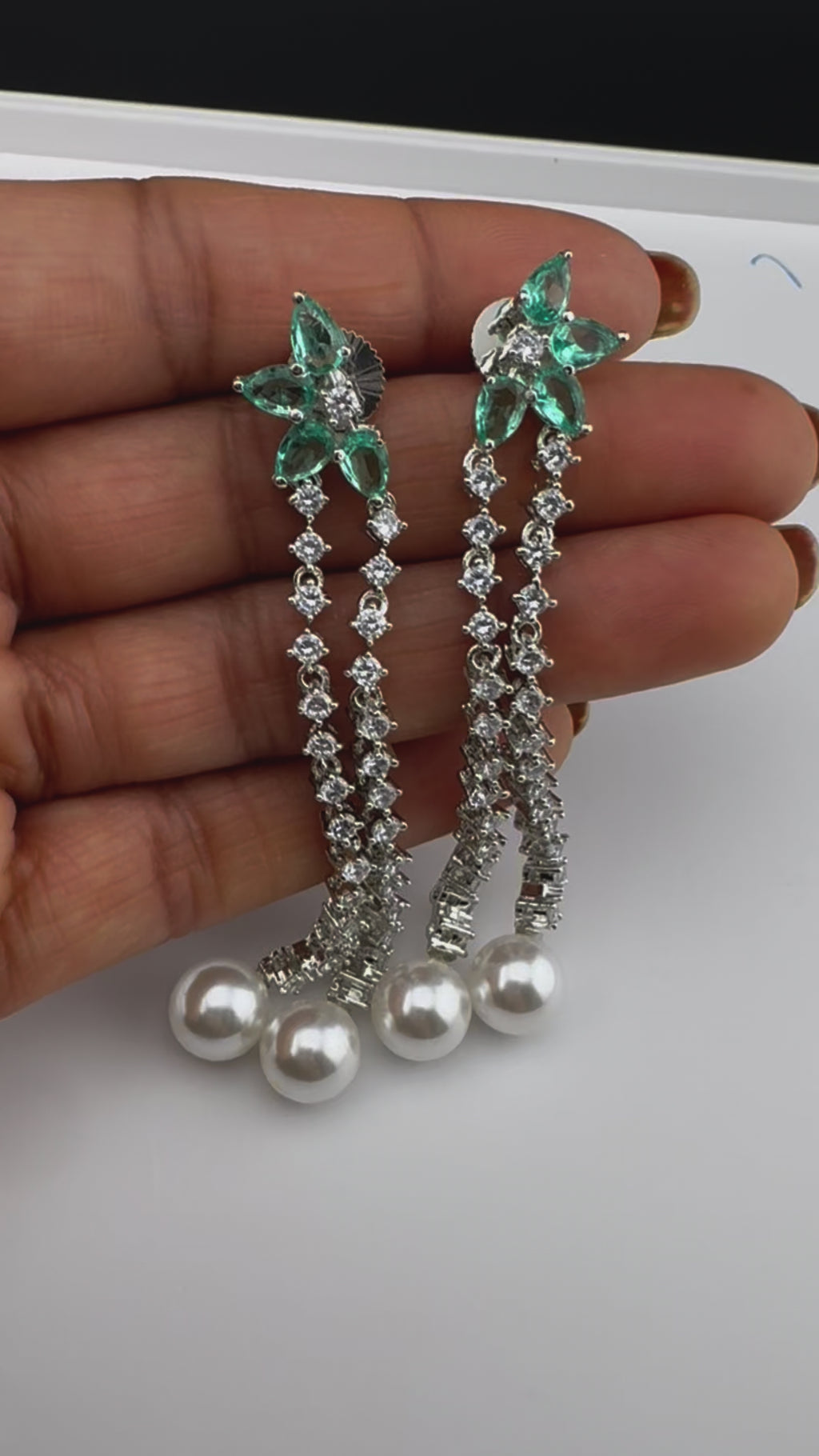 Premium silver color Cubic Zirconia Dangle long earrings with Crystal and Pearls is designer Statement long earrings