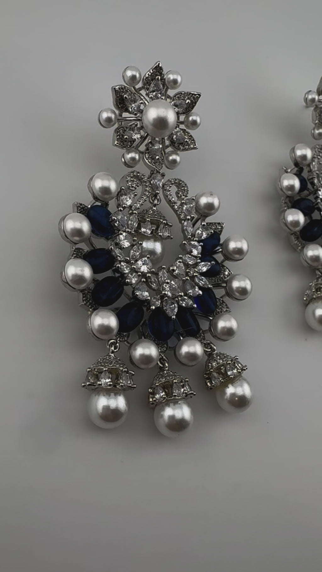 Premium Nano Setting Cubic Zirconia with Blue stones and Pearls is designer Inspired Statement Drop Dangle Long Chandbali earring
