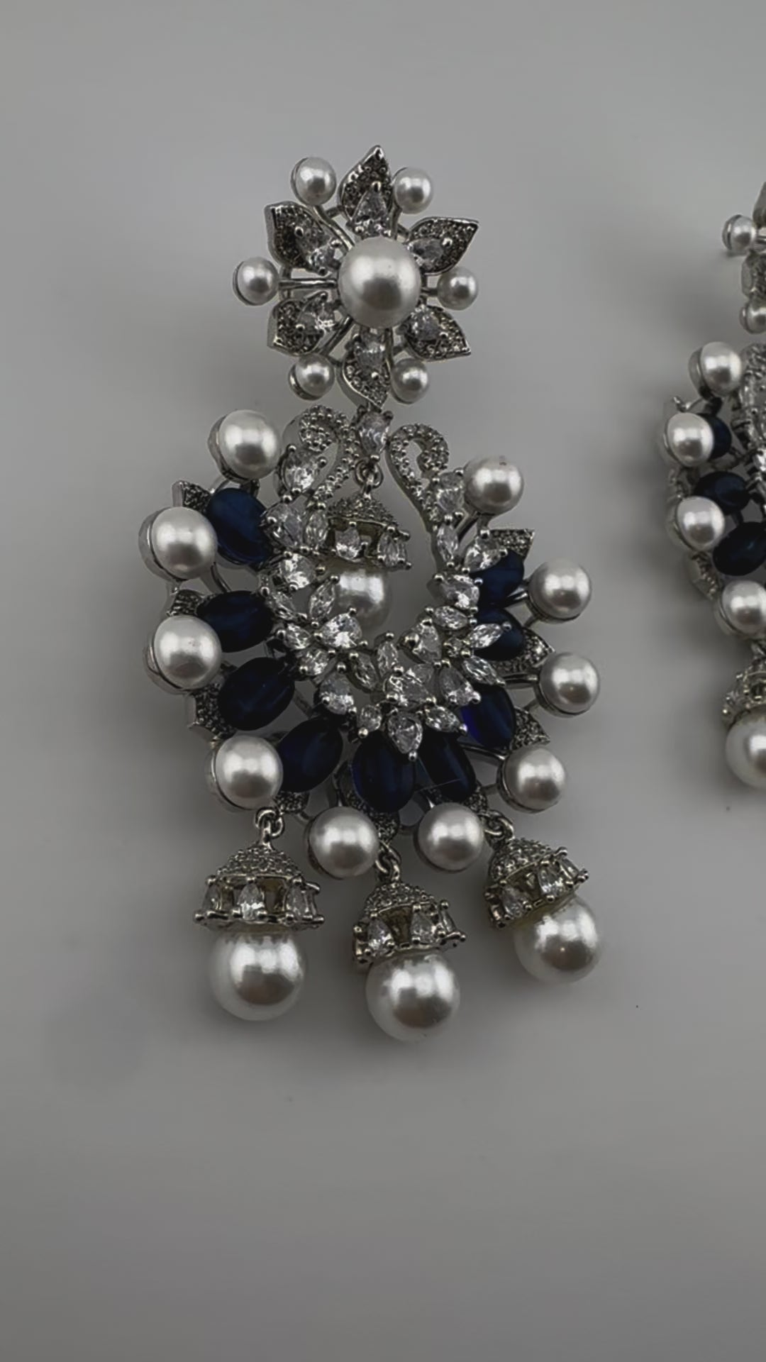 Premium Nano Setting Cubic Zirconia with Blue stones and Pearls is designer Inspired Statement Drop Dangle Long Chandbali earring