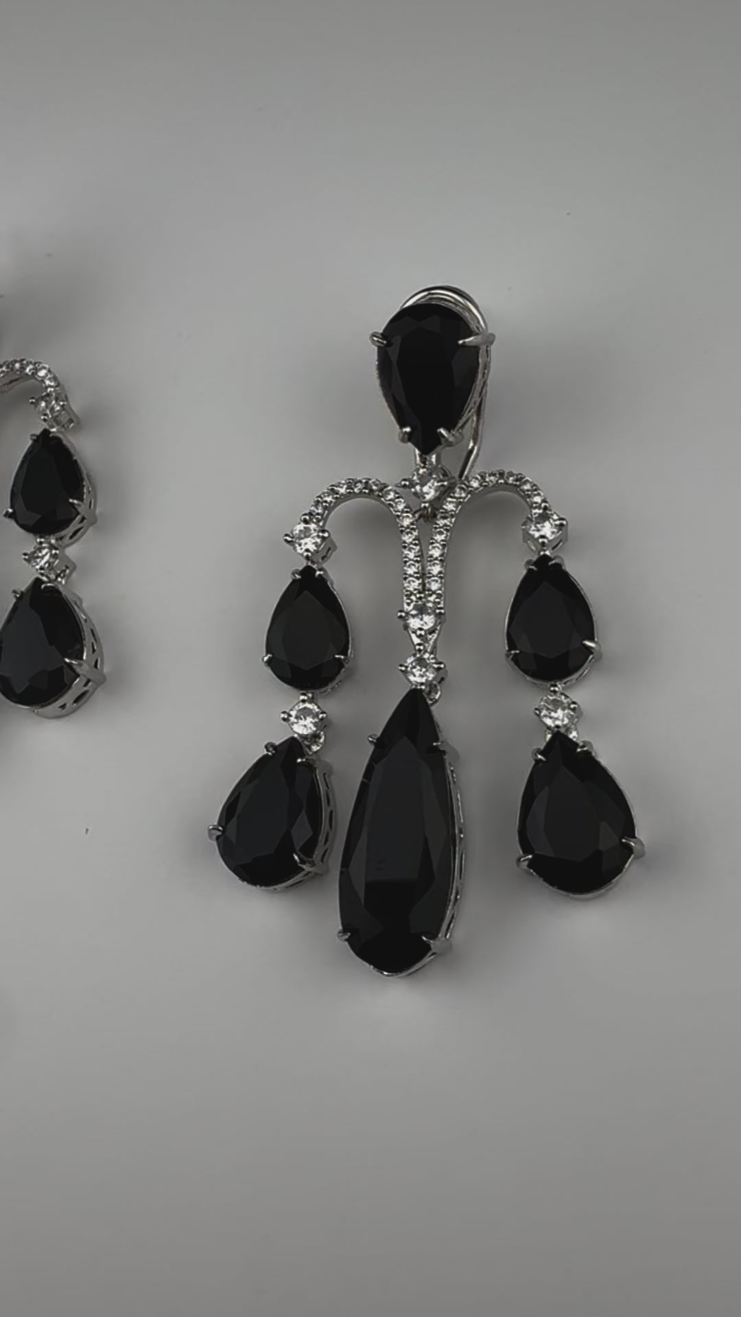 Premium Cubic Zirconia and glass stone in silver color is designer Inspired Statement Long earrings